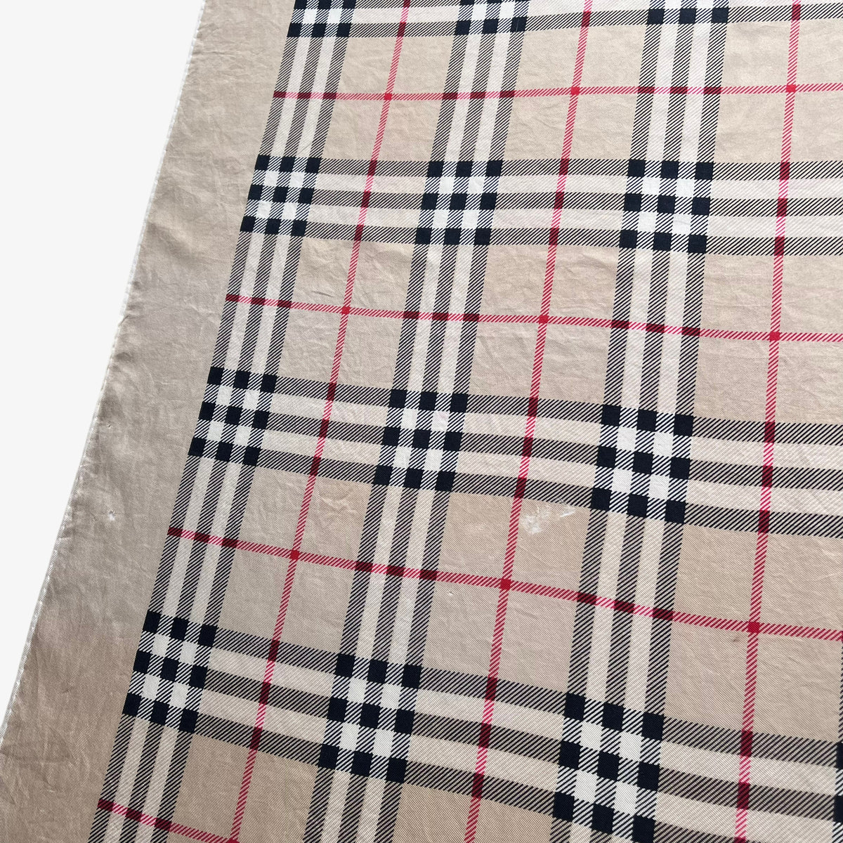 Patina on women's vintage 80s Burberry London nova check print silk scarf.