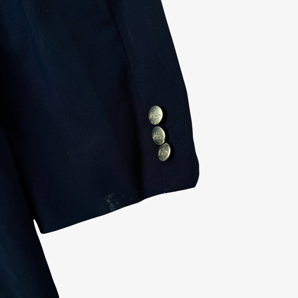 Cuff of men's vintage 80s Giorgio Armani Le Collezioni navy double breasted wool blazer.