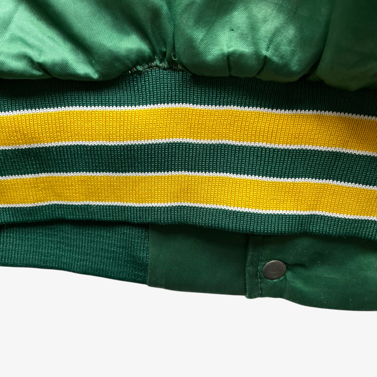 Patina on vintage 80s men's Swingster MLB Oakland Athletics green varsity jacket.