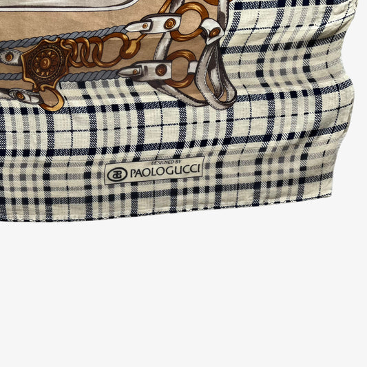 Paolo Gucci spell out logo on women's vintage 80s equestrian buckle and tartan print brown silk scarf.