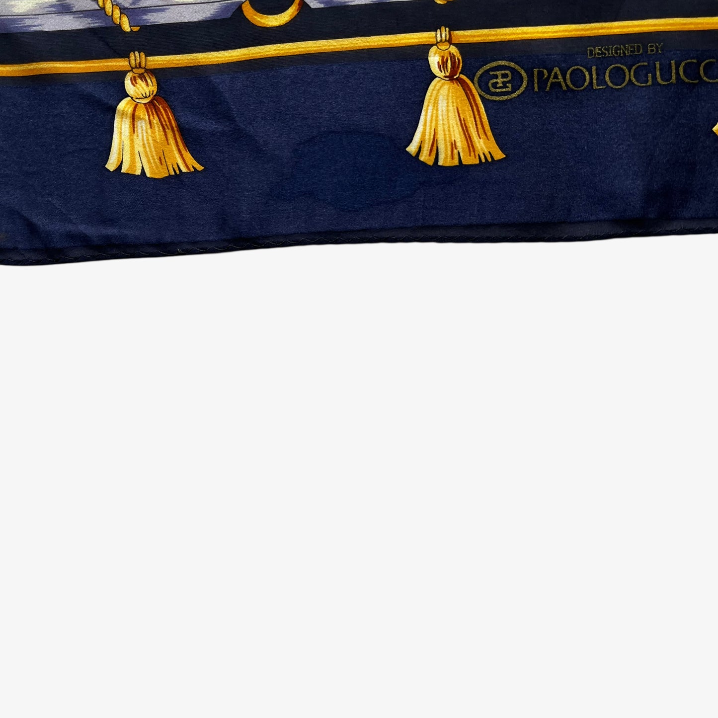 Patina on vintage 80s Paolo Gucci equestrian horse racing and tartan print blue silk scarf.