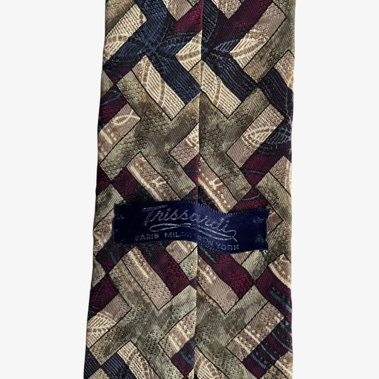 Vintage 80s Trussardi label stitched on the back of an abstract geometric print silk tie.