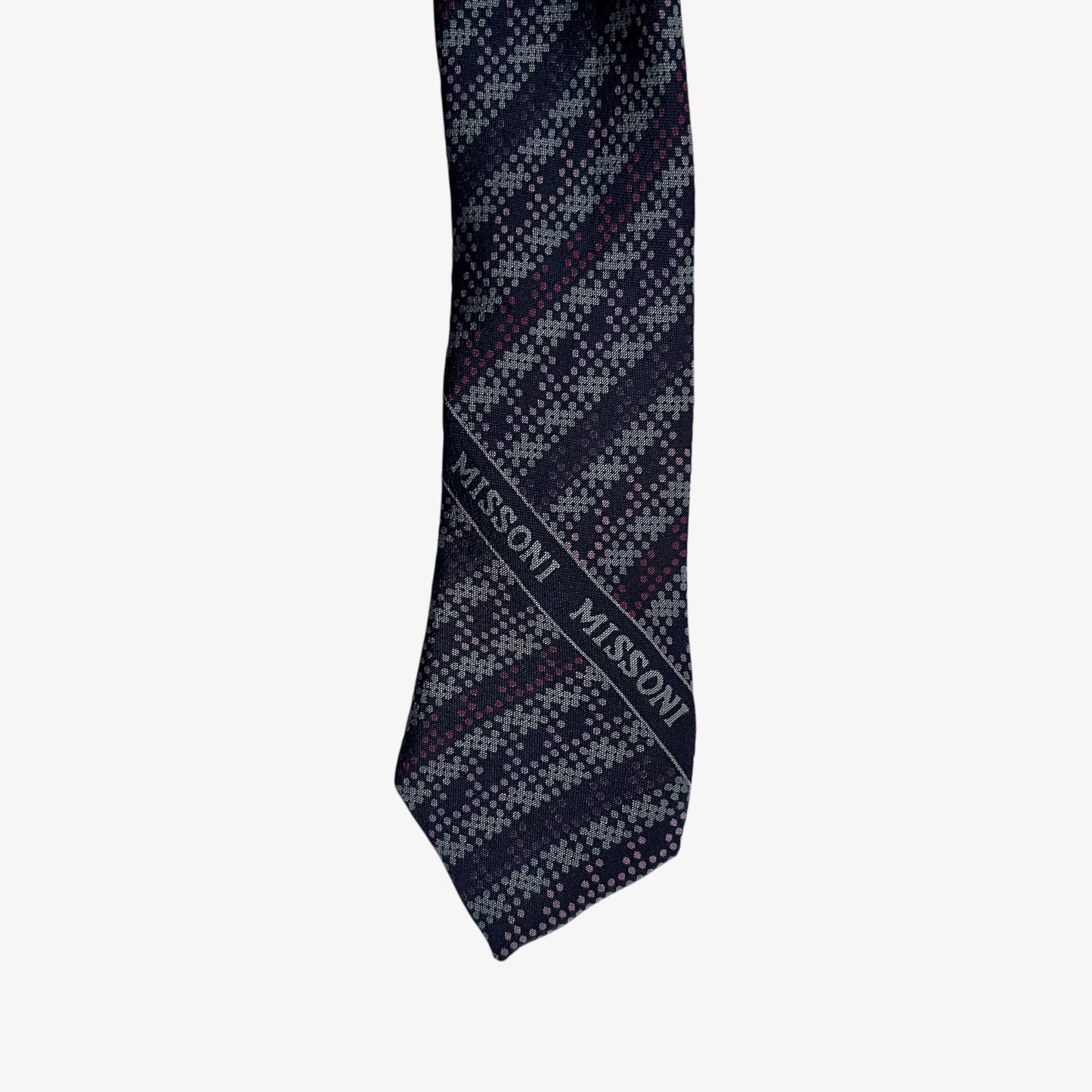 Missoni tag printed on the bottom of a vintage 90s striped silk tie.