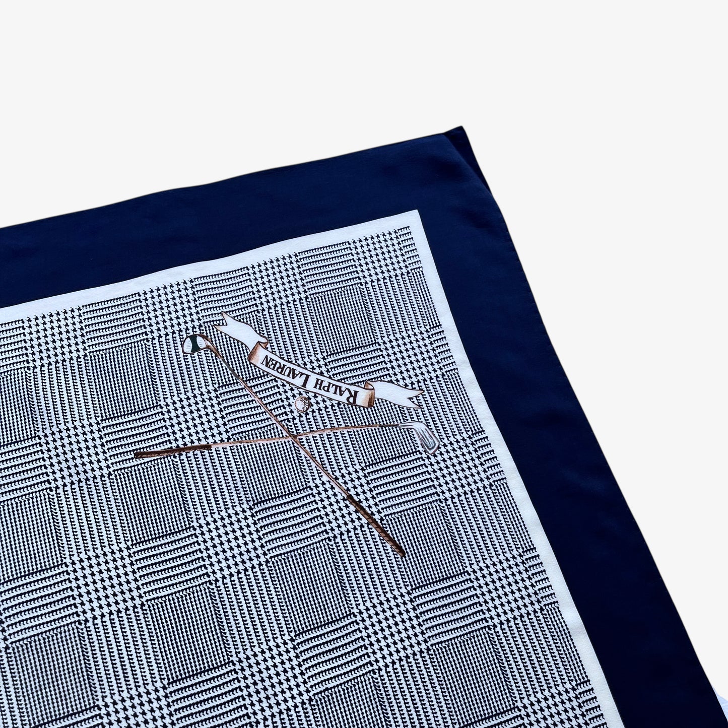 Golf club print on vintage 90s women's Ralph Lauren houndstooth print navy silk scarf.