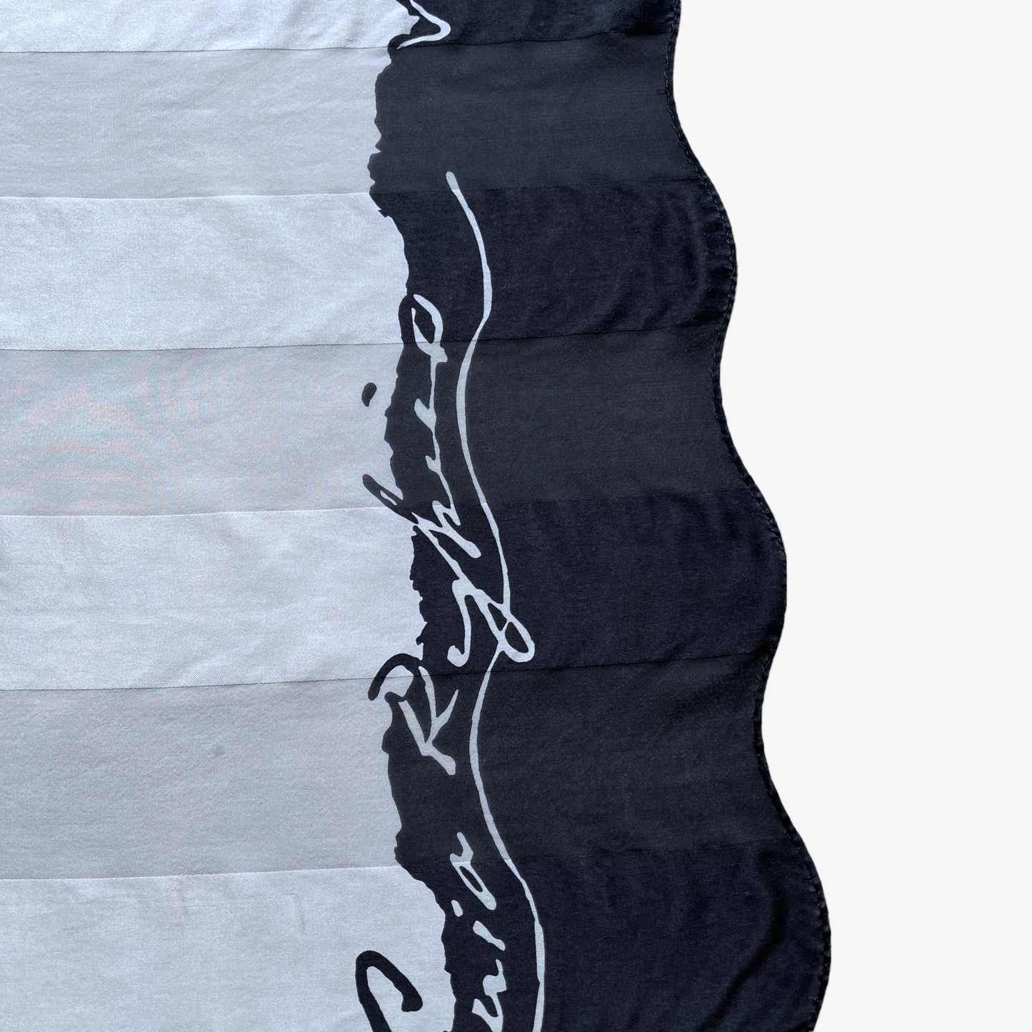 General wear on vintage 90s women's Sonia Rykiel foulards black and white spell out print striped silk scarf.