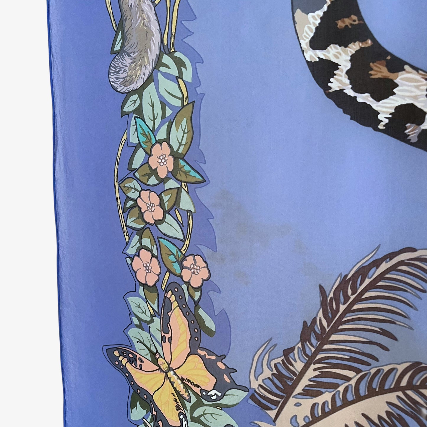Patina on vintage Y2K Hermes jungle love leopard print blue silk scarf.