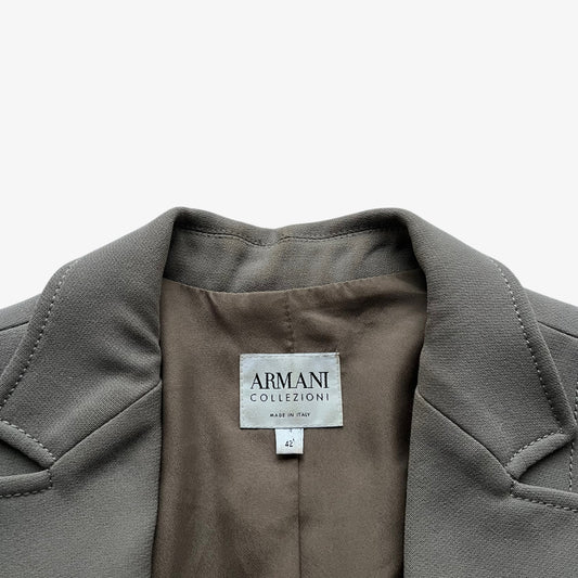 Vintage Y2K Armani Collezioni label stitched inside of a women's grey single breasted blazer.