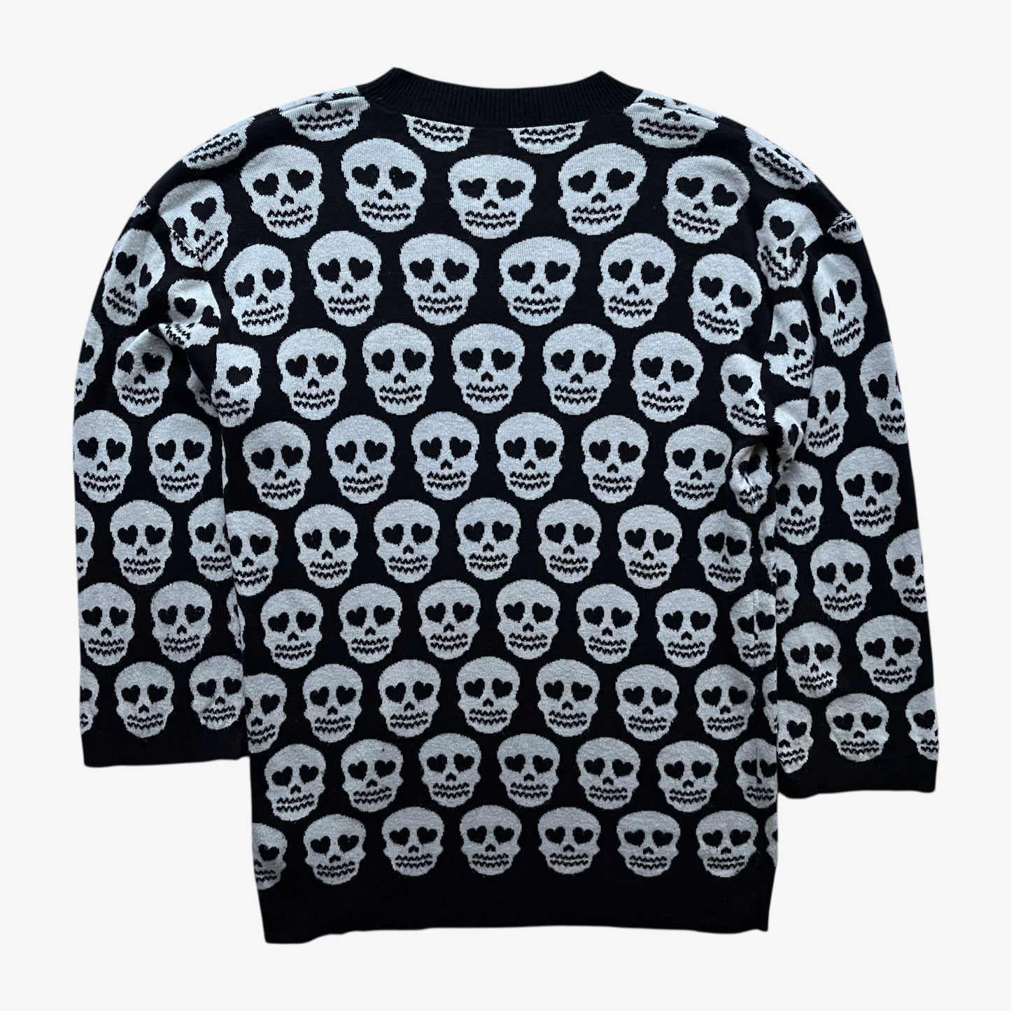 Back of women's vintage Y2K Love Moschino geometric skull print black wool blend jumper.