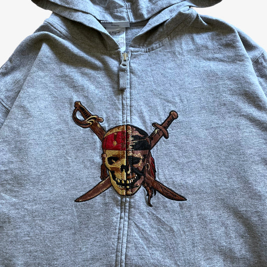 Vintage Y2K Womens Walt Disney World Pirates Of The Caribbean Embroidered Skull Grey Hooded Jacket Logo - Casspios Dream