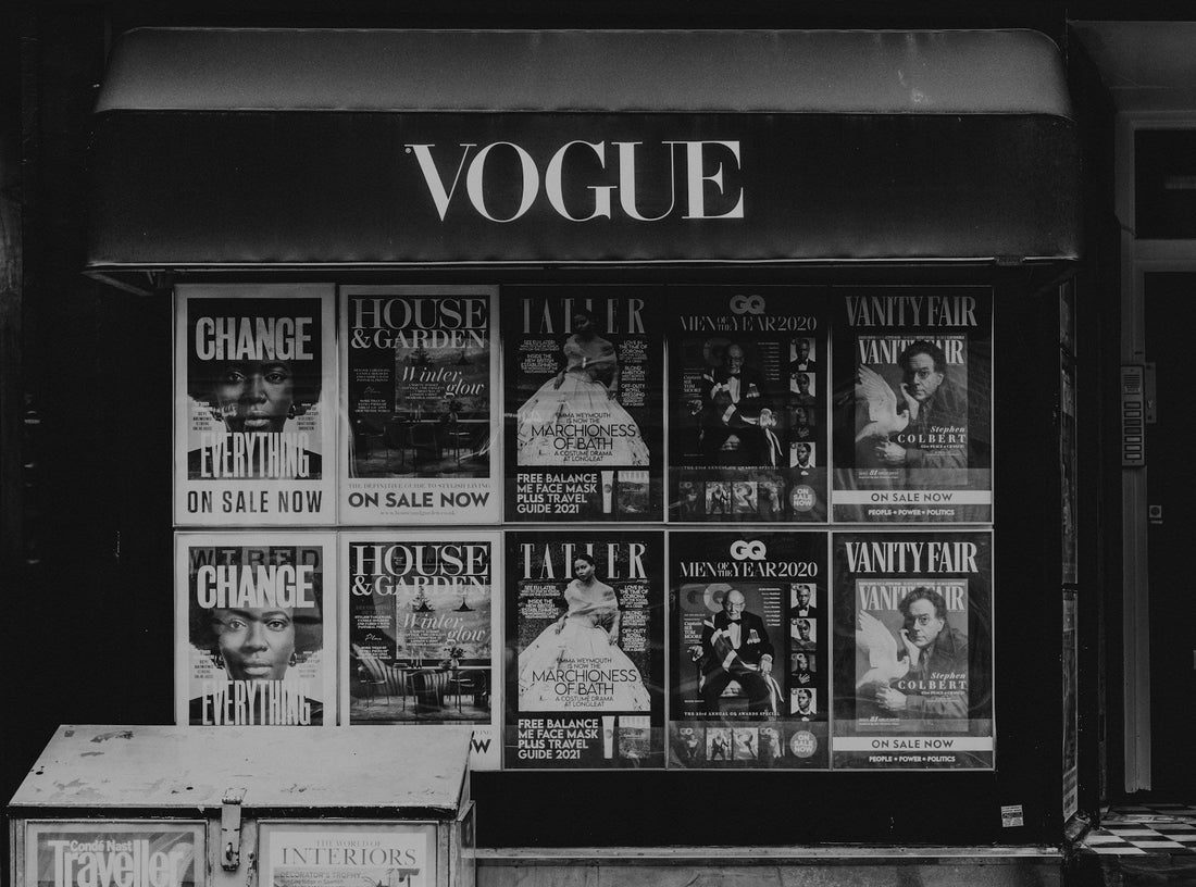 Close up of Vogue fashion magazine's cover art being shown in a vintage store.