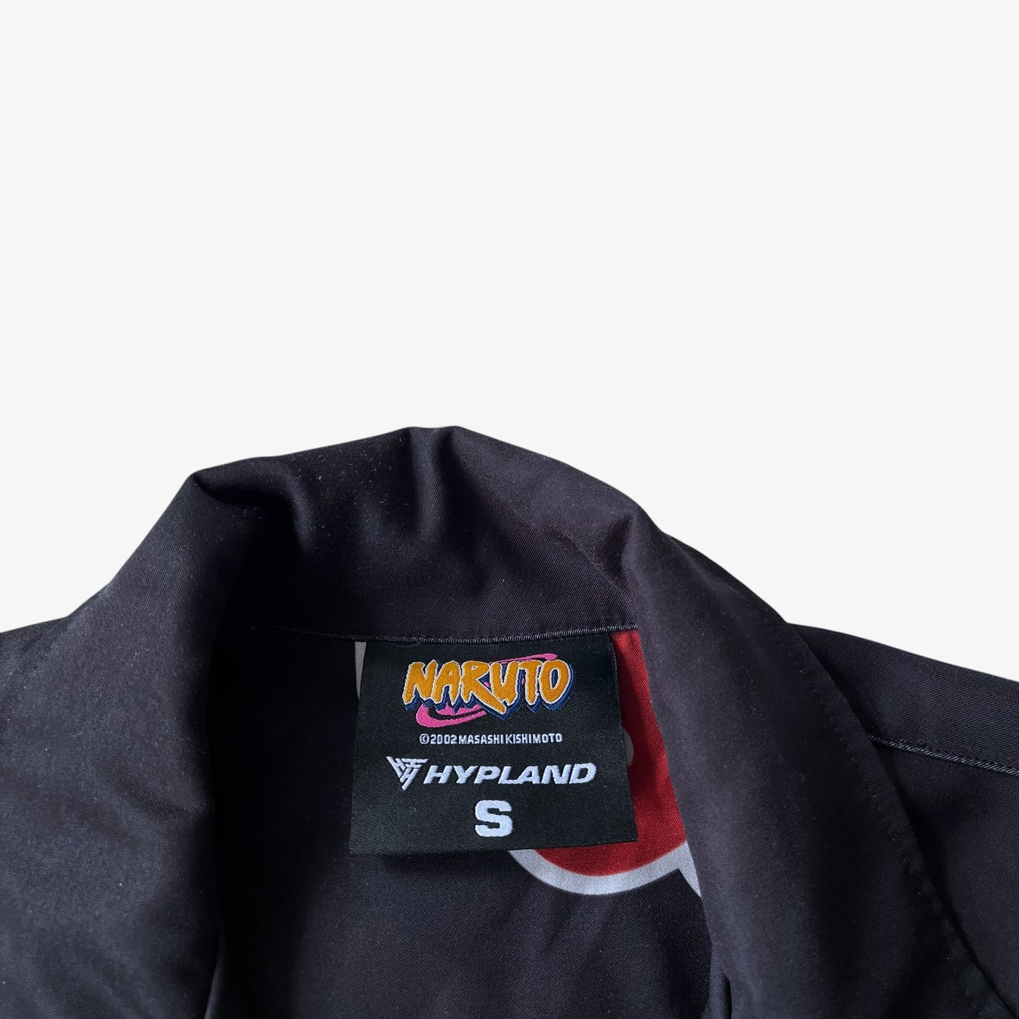 Naruto themed Akatsuki shirt with Hyland label on a white background.