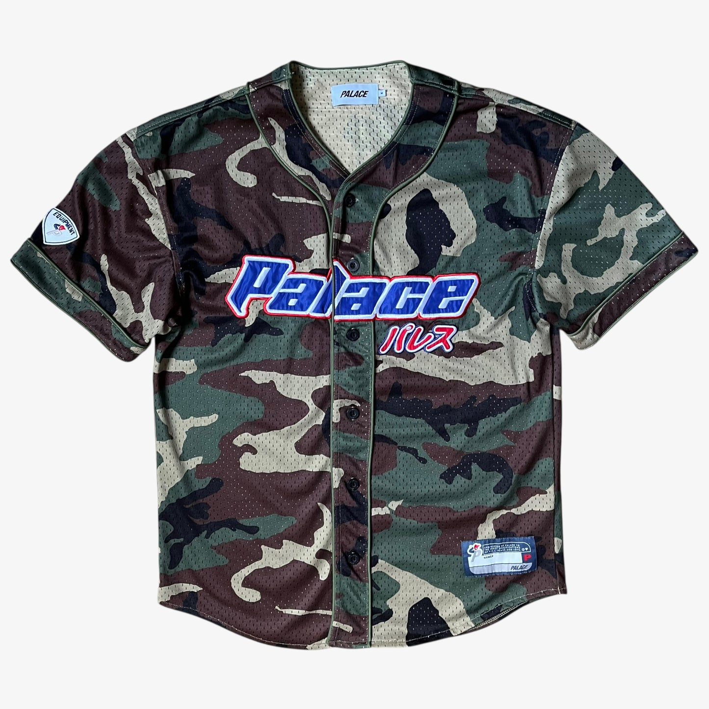 Men's Palace kawaii green camouflage baseball jersey featuring an embroidered spell out.