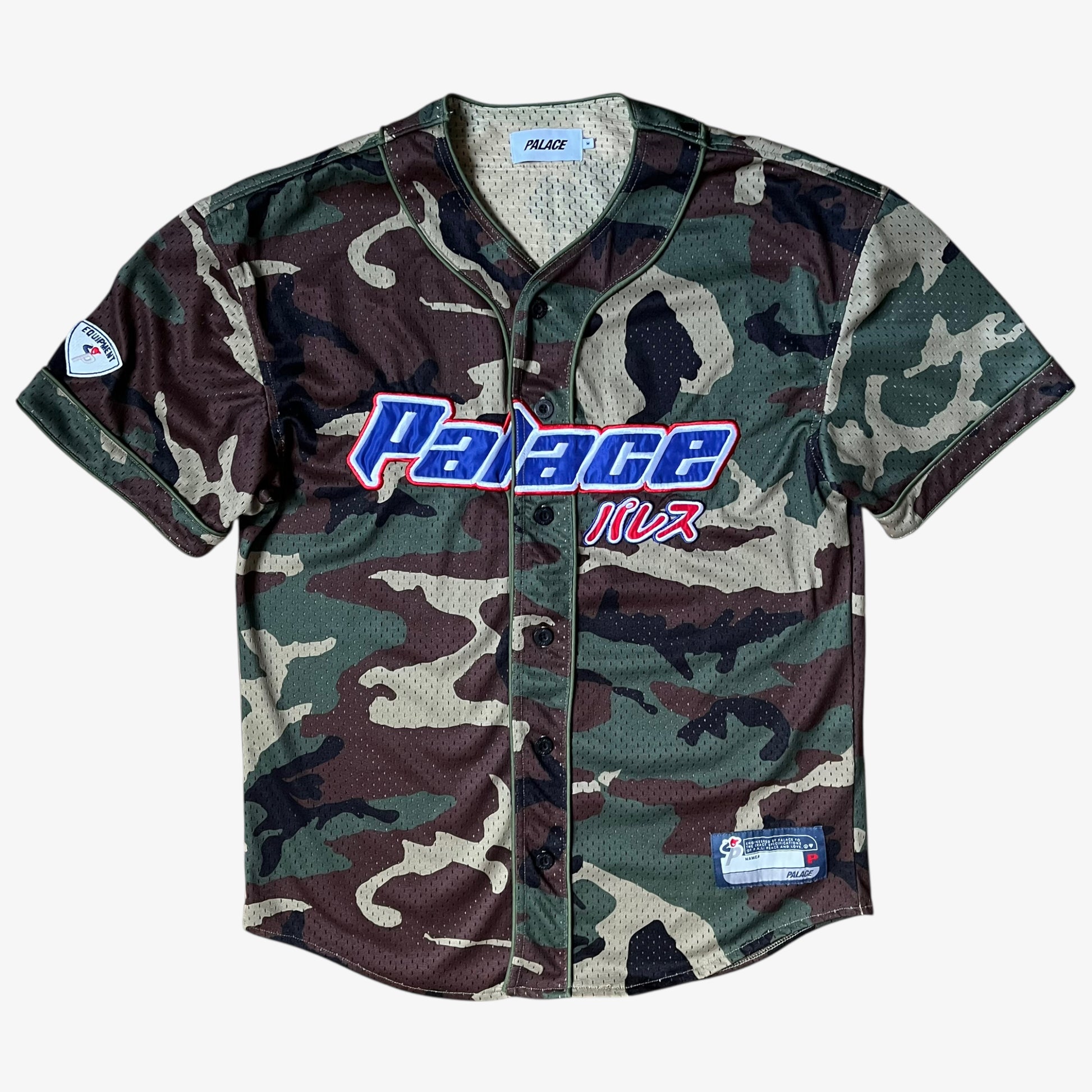 Men's Palace kawaii green camouflage baseball jersey featuring an embroidered spell out.