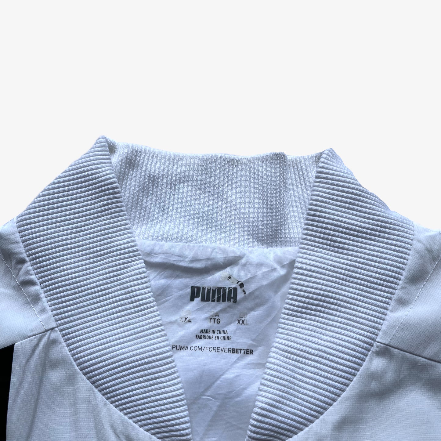 Puma label inside of men's Porsche 911 GT3R spell out print white driving jacket.