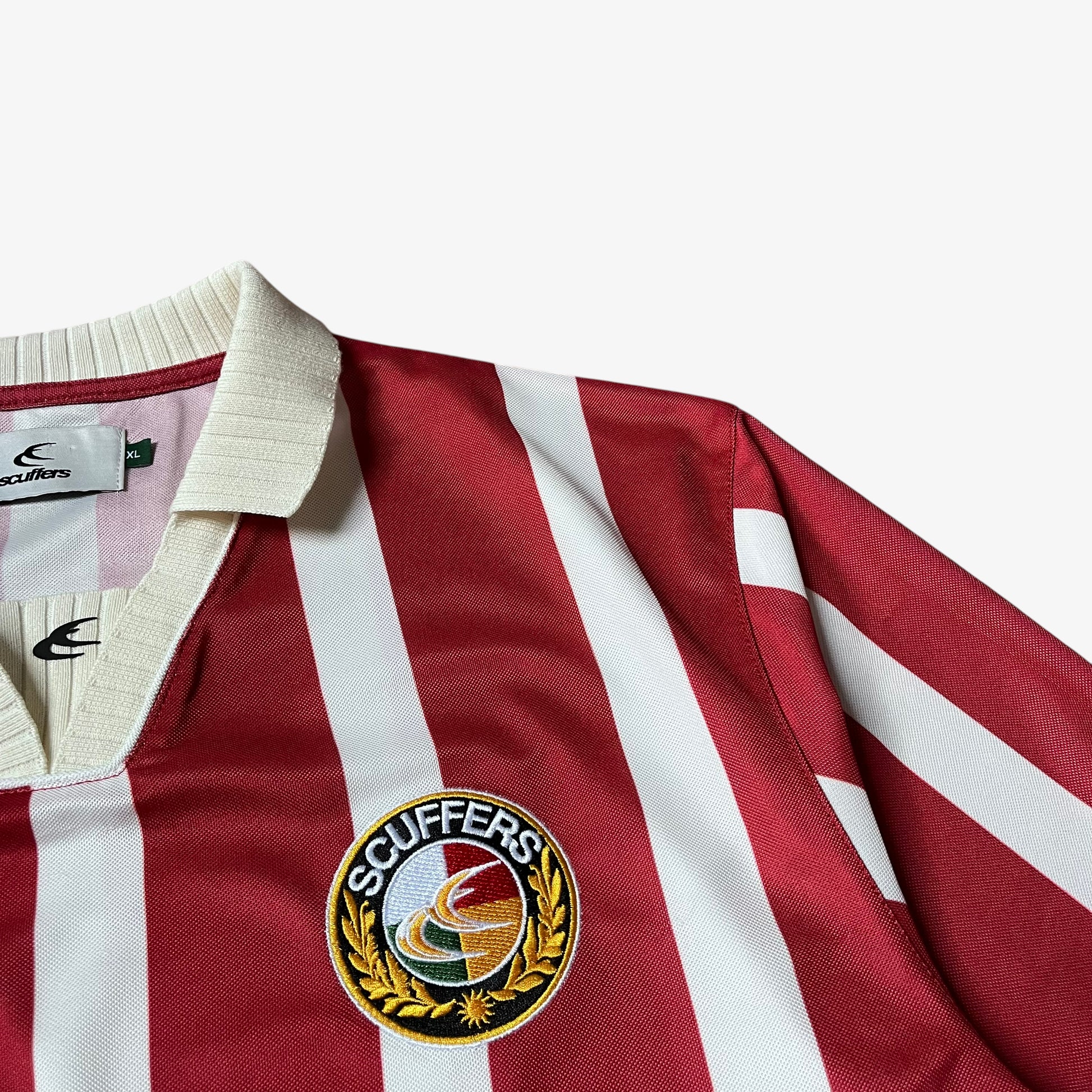 Embroidered Scuffers logo on the chest of men's red and white striped football jersey.