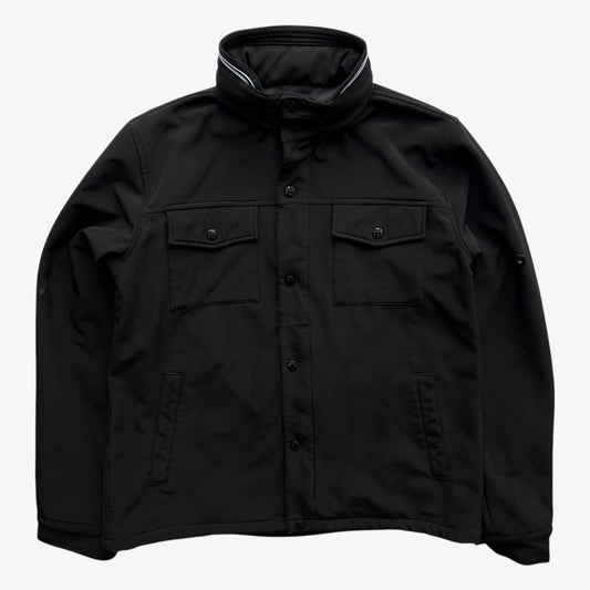 Men's Stone Island Soft Shell R black utility jacket with foldable hood.