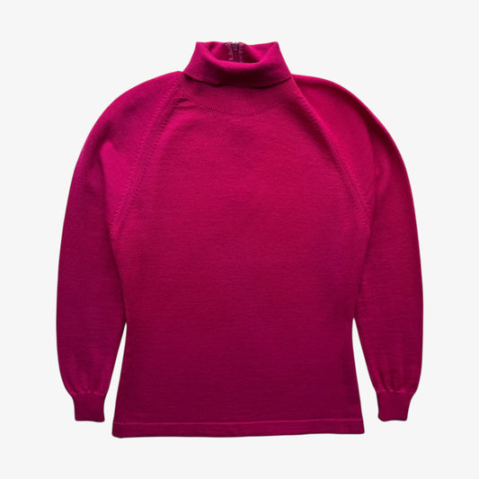 Vintage 60s women's Emilio Pucci pink turtleneck jumper on a white background.