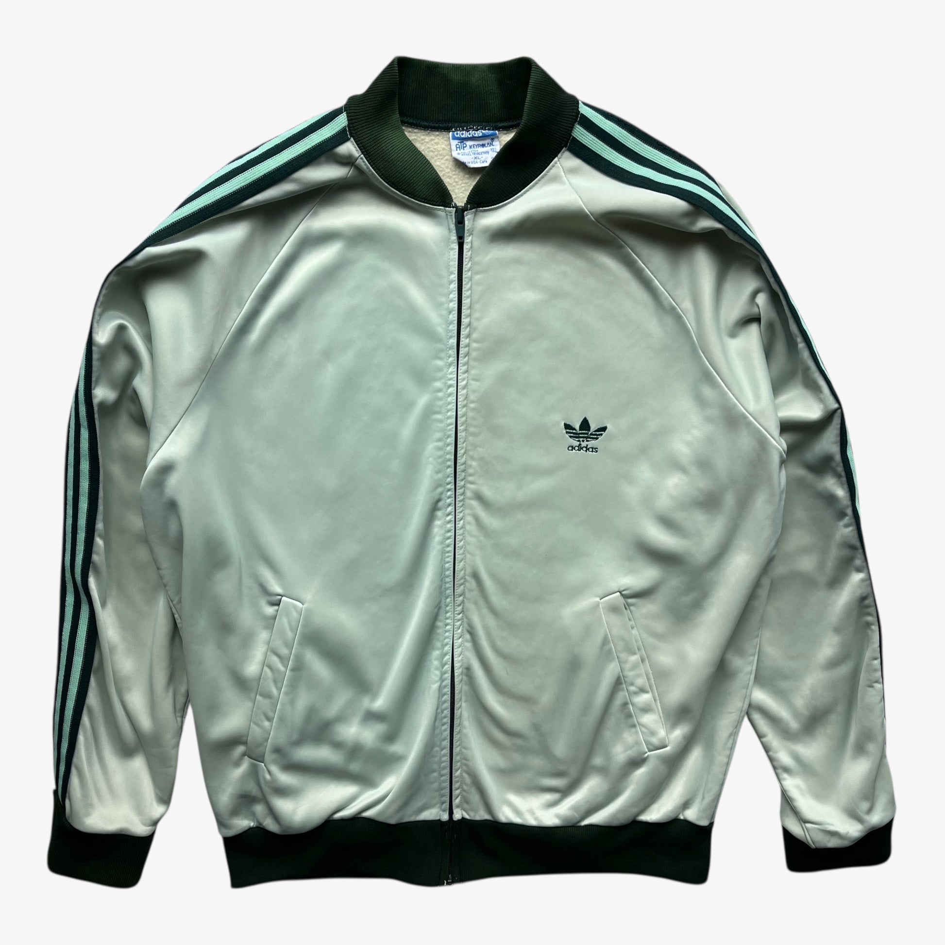 Men's vintage 70s Adidas ATP Keyrolan green track jacket.