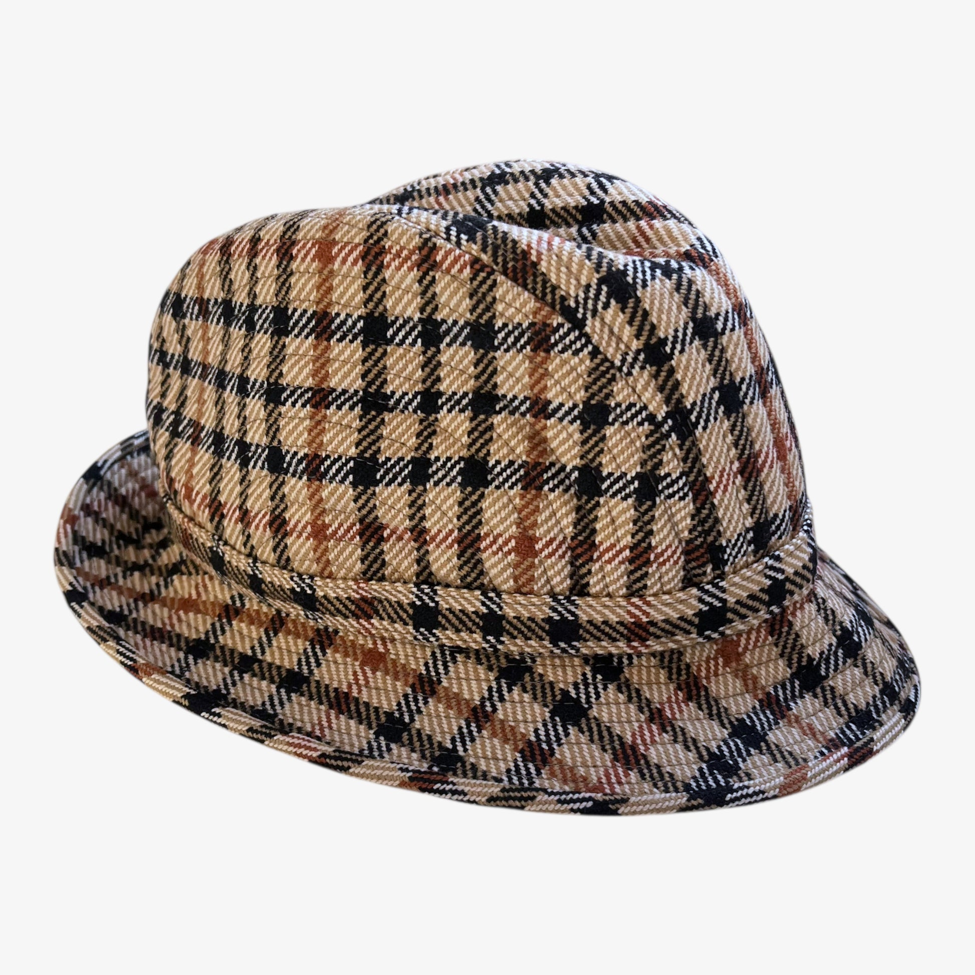 Side of vintage 70s women's Daks house check print wool trilby hat.