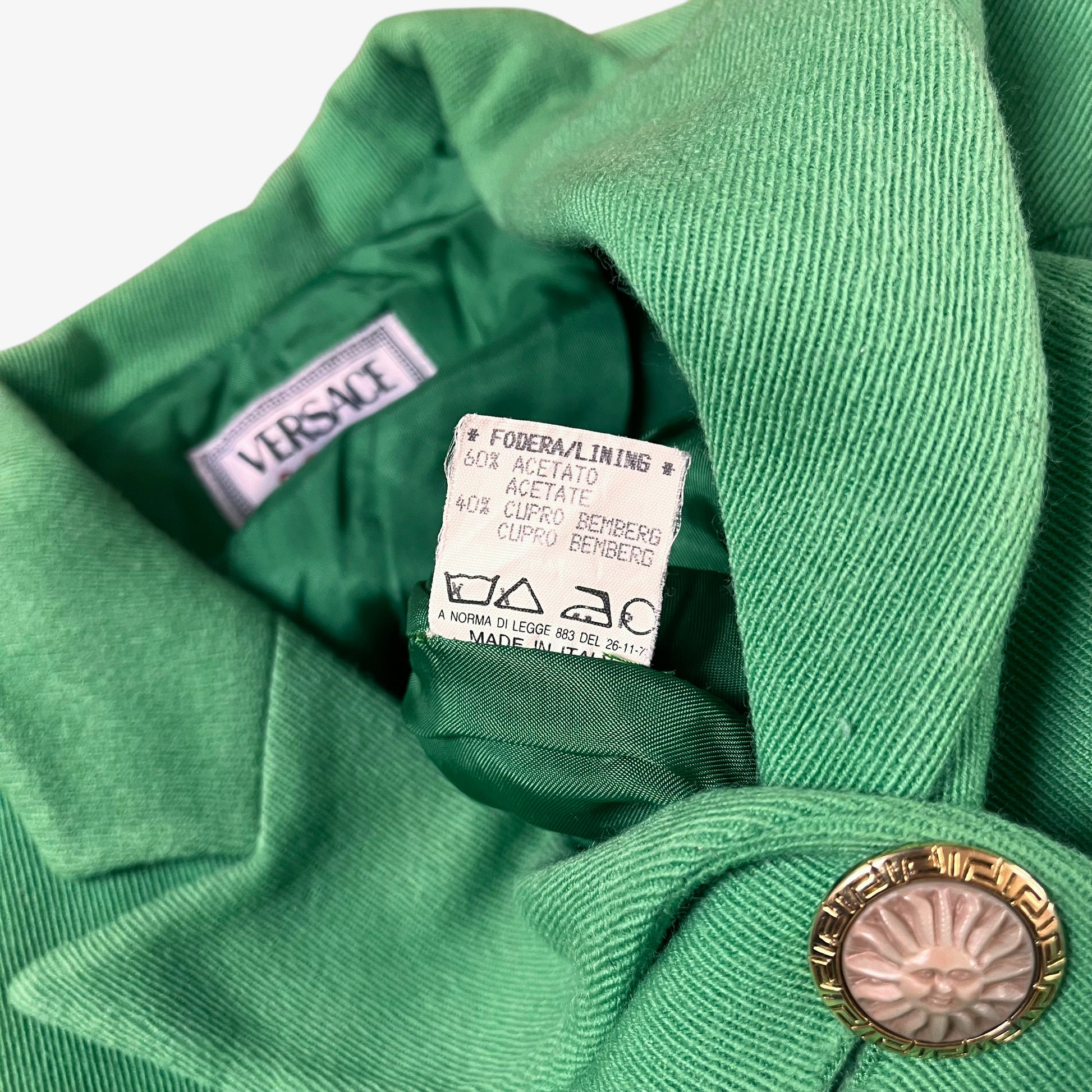 Made in Italy label for vintage 70s Versace Sport women’s green wool blazer.