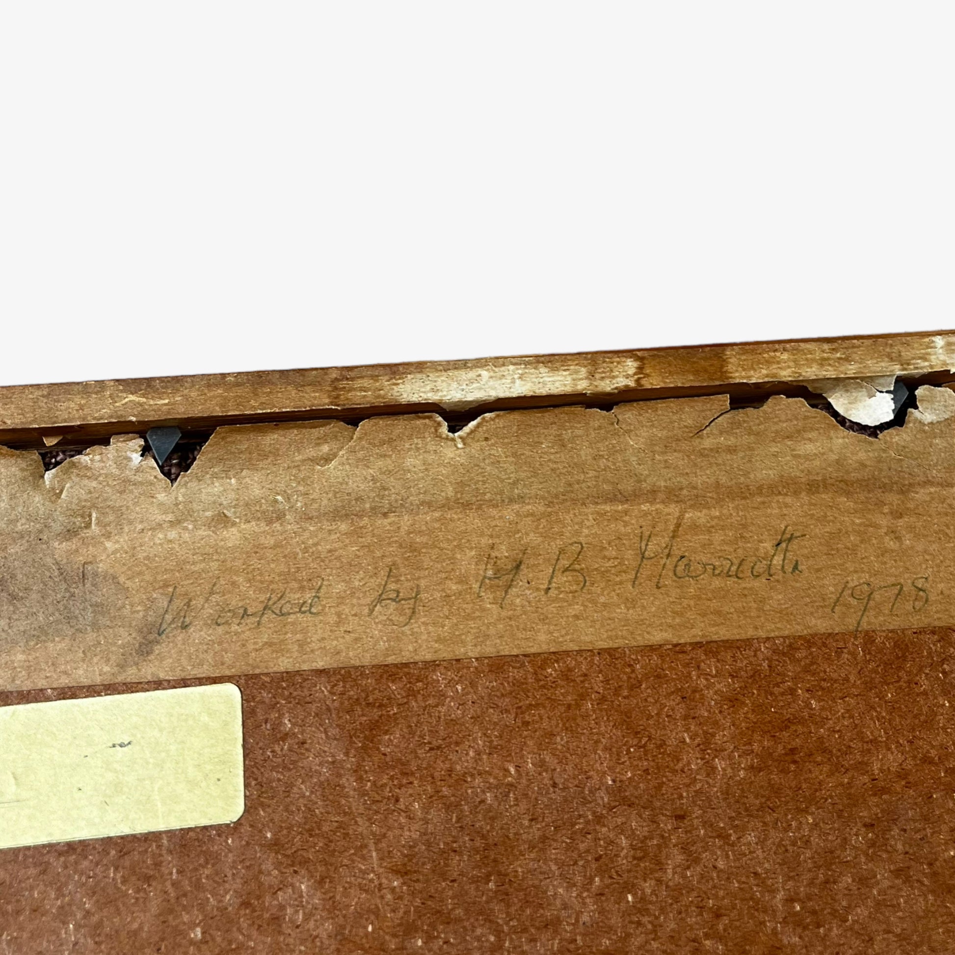 Signature from 1978 on the back of wooden framed vintage 70s peacock cross stitch tapestry.