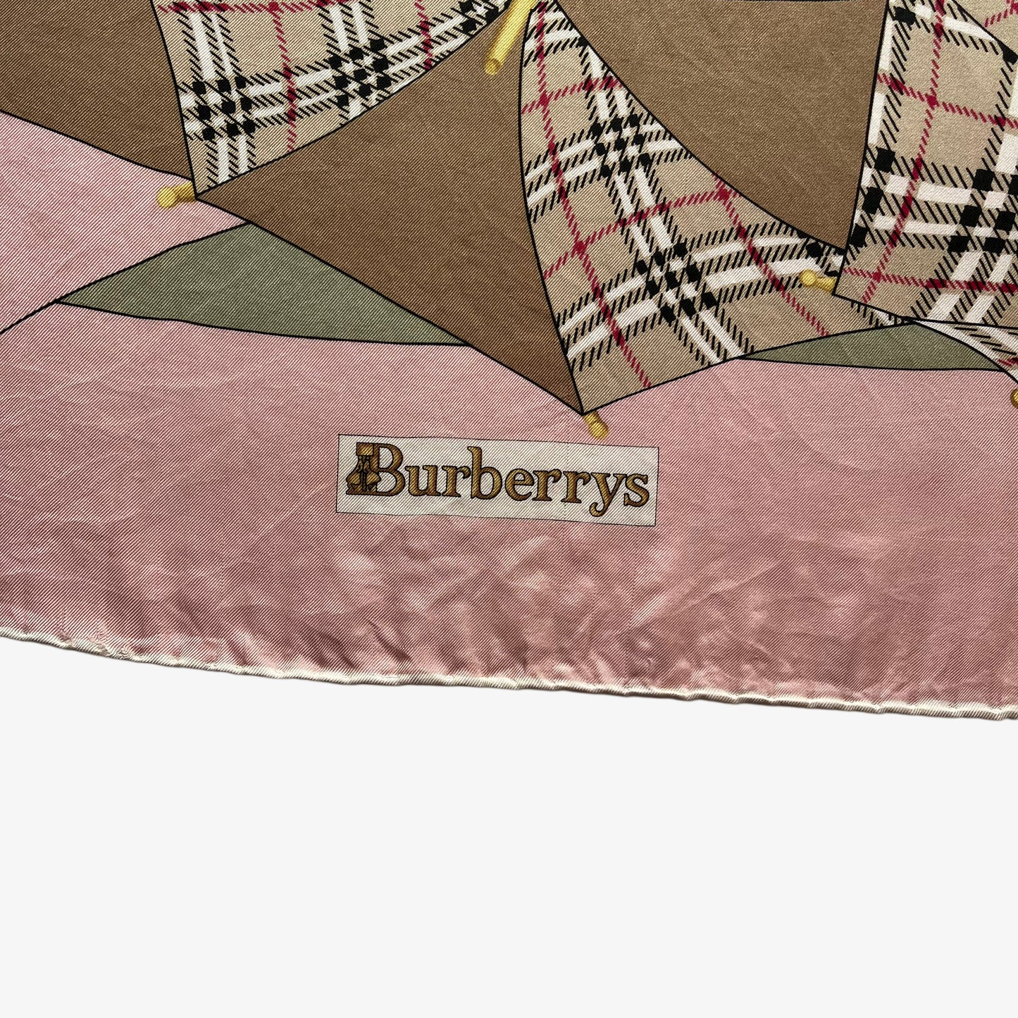 Burberrys spell out logo on women's vintage 80s Burberry nova check umbrella print pink silk scarf.