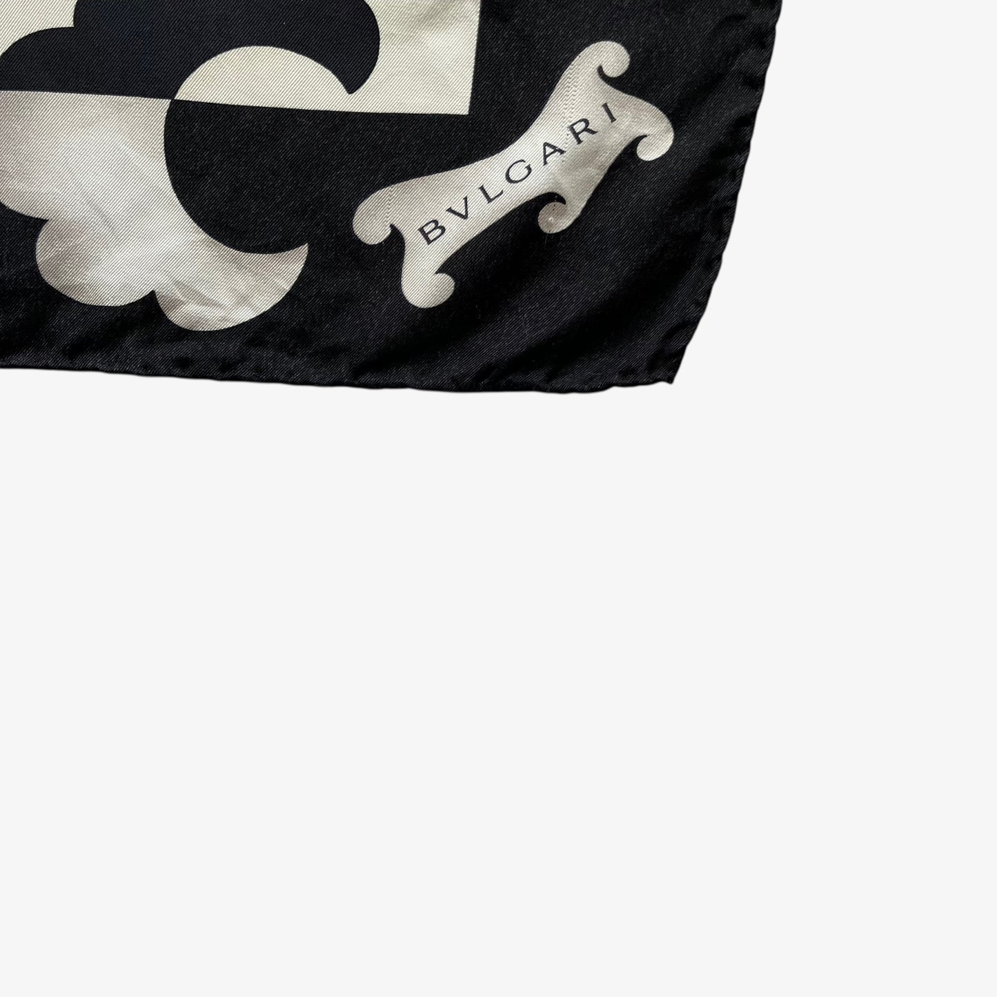 Bvlgari spell out logo of women's vintage 80s abstract geometric accessories print black silk scarf.