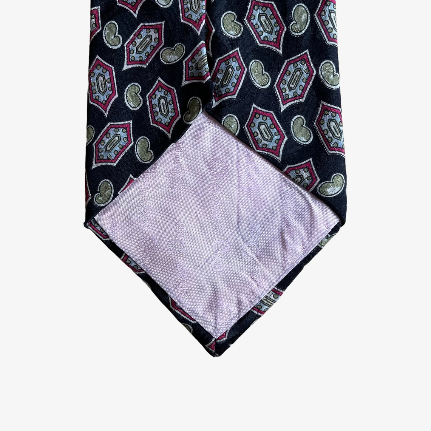Back of vintage 80s Christian Dior monsieur paisley print silk tie.