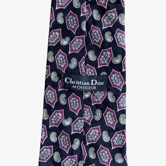 Label of vintage 80s Christian Dior monsieur paisley print silk tie.