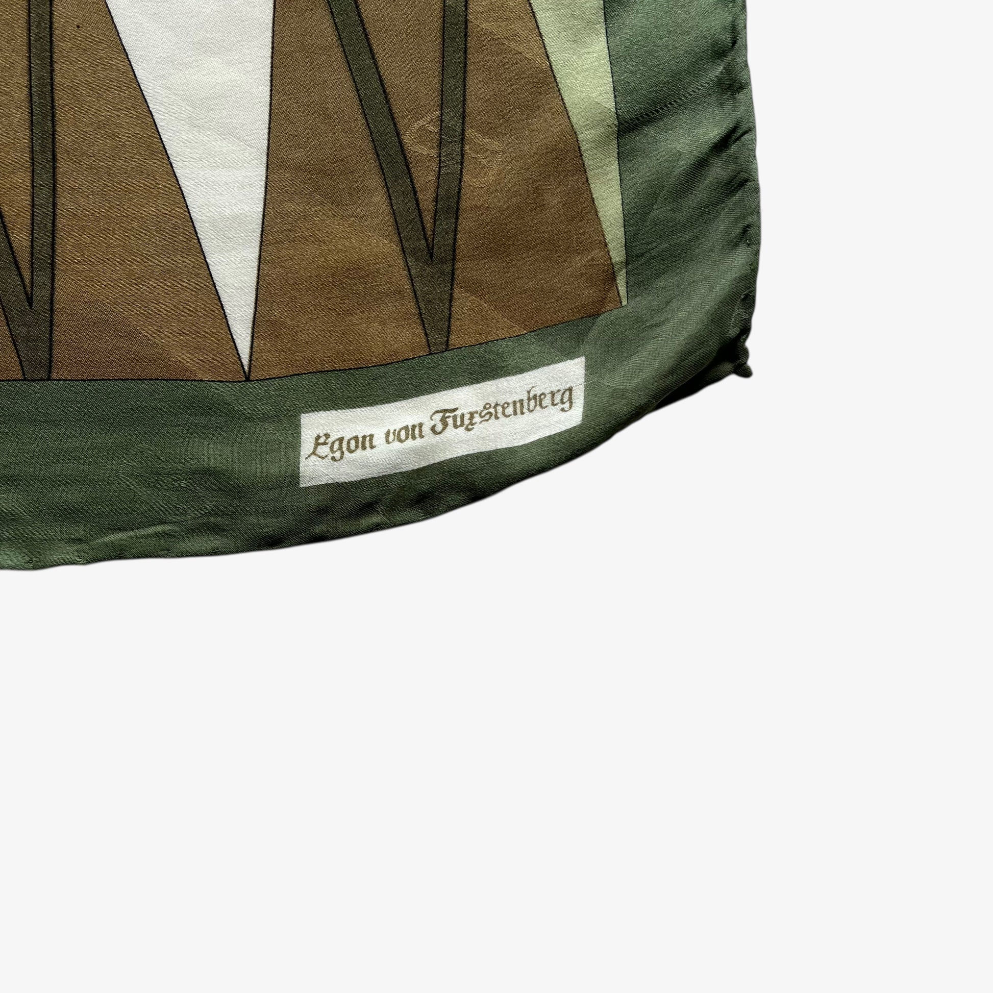 Logo of women's vintage 80s Egon Von Furstenberg abstract brown and pink tartan print green silk scarf.