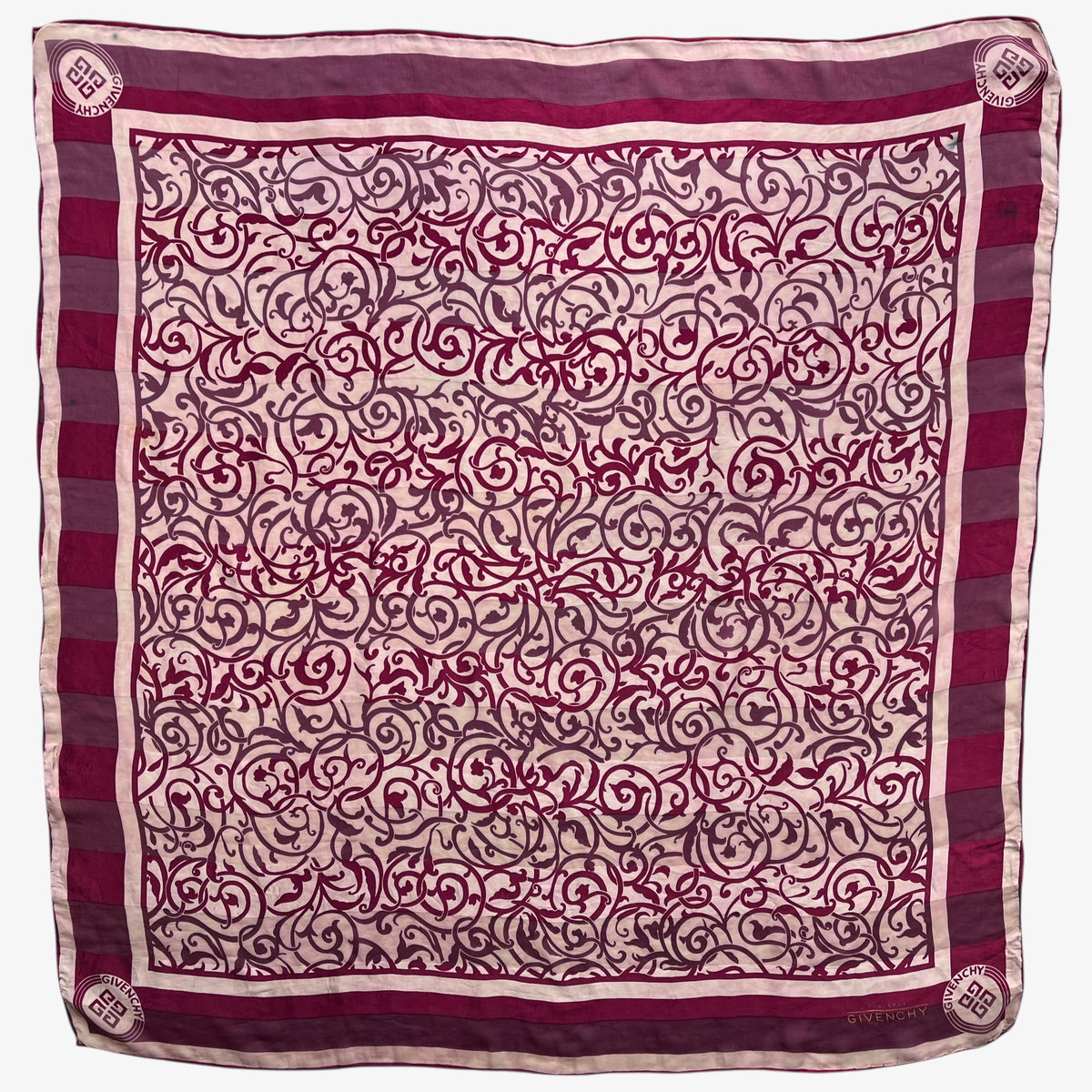 Women's 80s vintage Givenchy Foulards red silk scarf with abstract floral print.