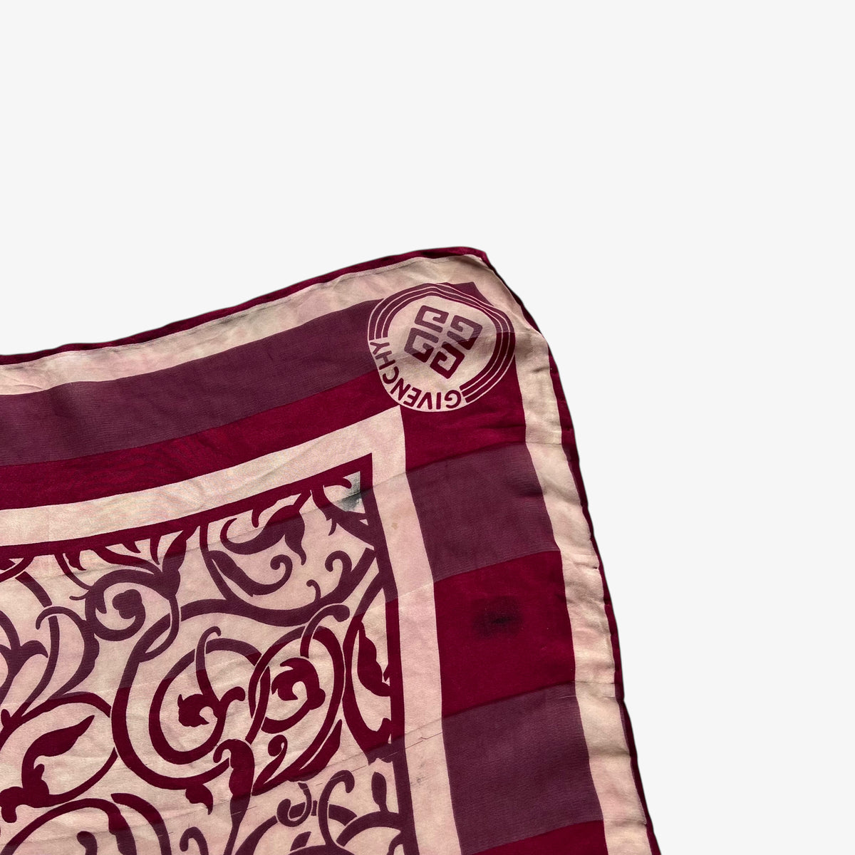 Givenchy logo on women's 80s vintage red silk scarf with abstract floral print.