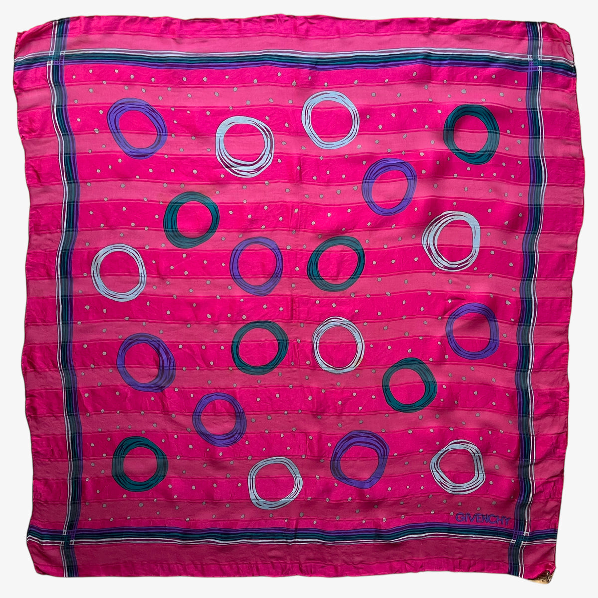 Women's vintage 80s Givenchy pink silk scarf with a colourful polka dot pattern.