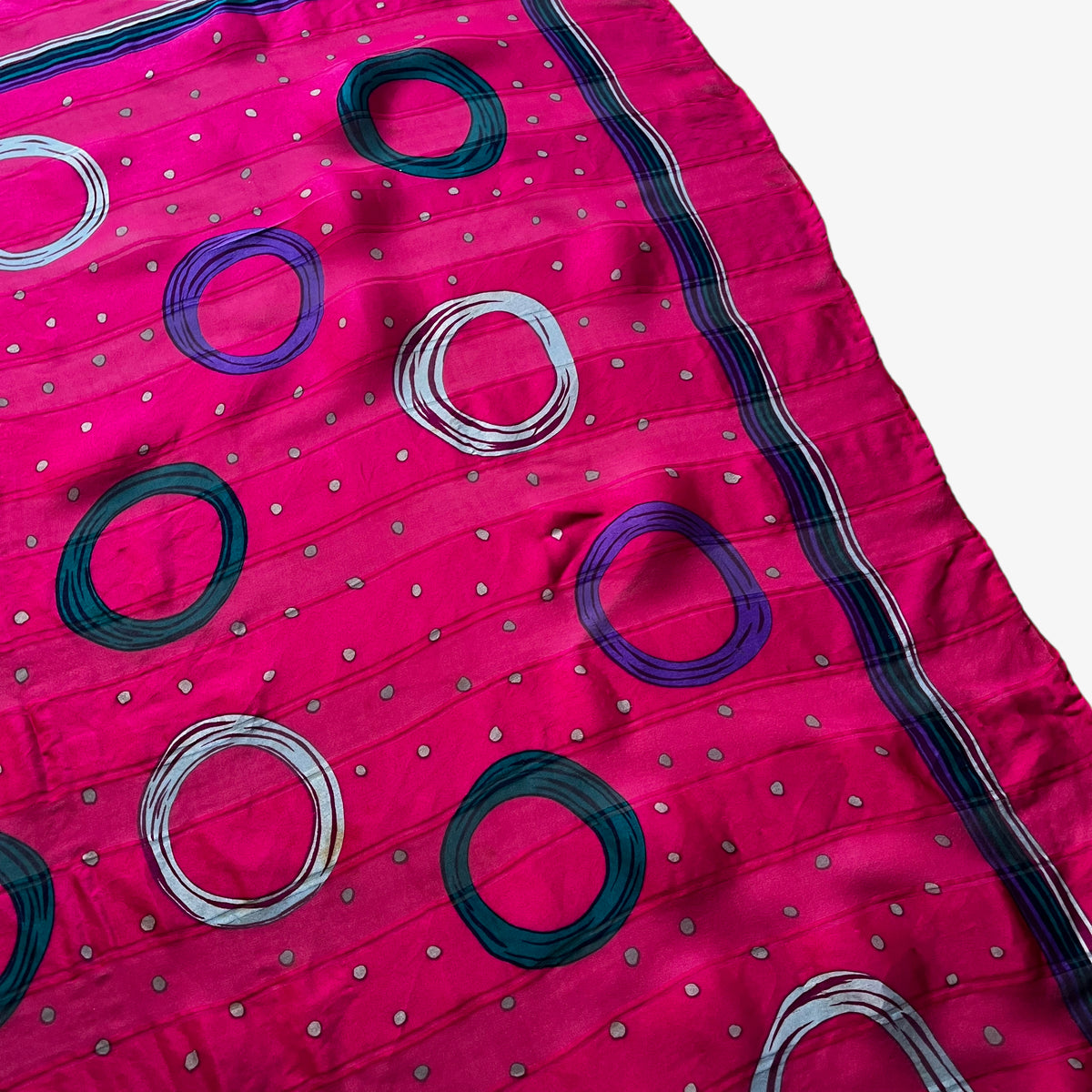 Patina of women's vintage 80s Givenchy pink silk scarf with a colourful polka dot pattern.