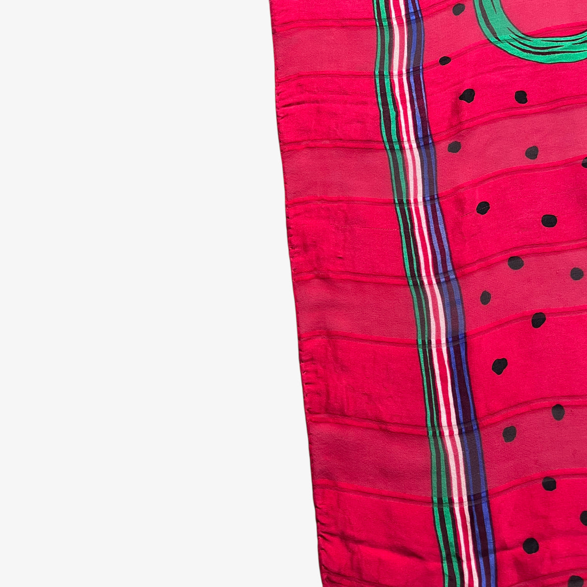 Side of vintage 80s Givenchy red silk scarf which features a polka dot print.