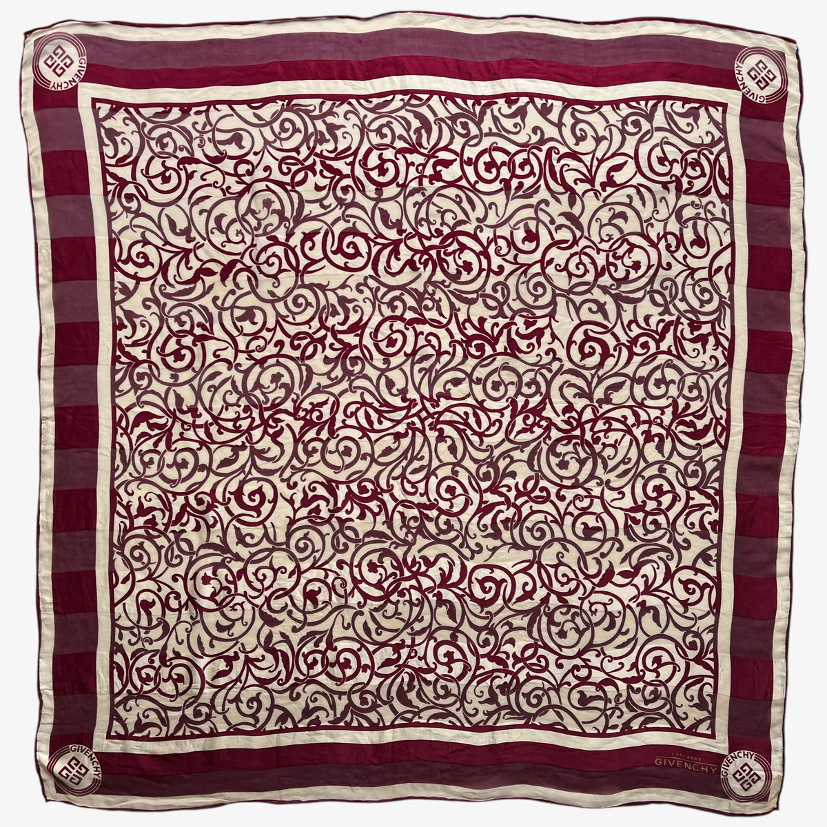 Women's vintage 80s Givenchy Foulards red silk scarf with abstract floral print.