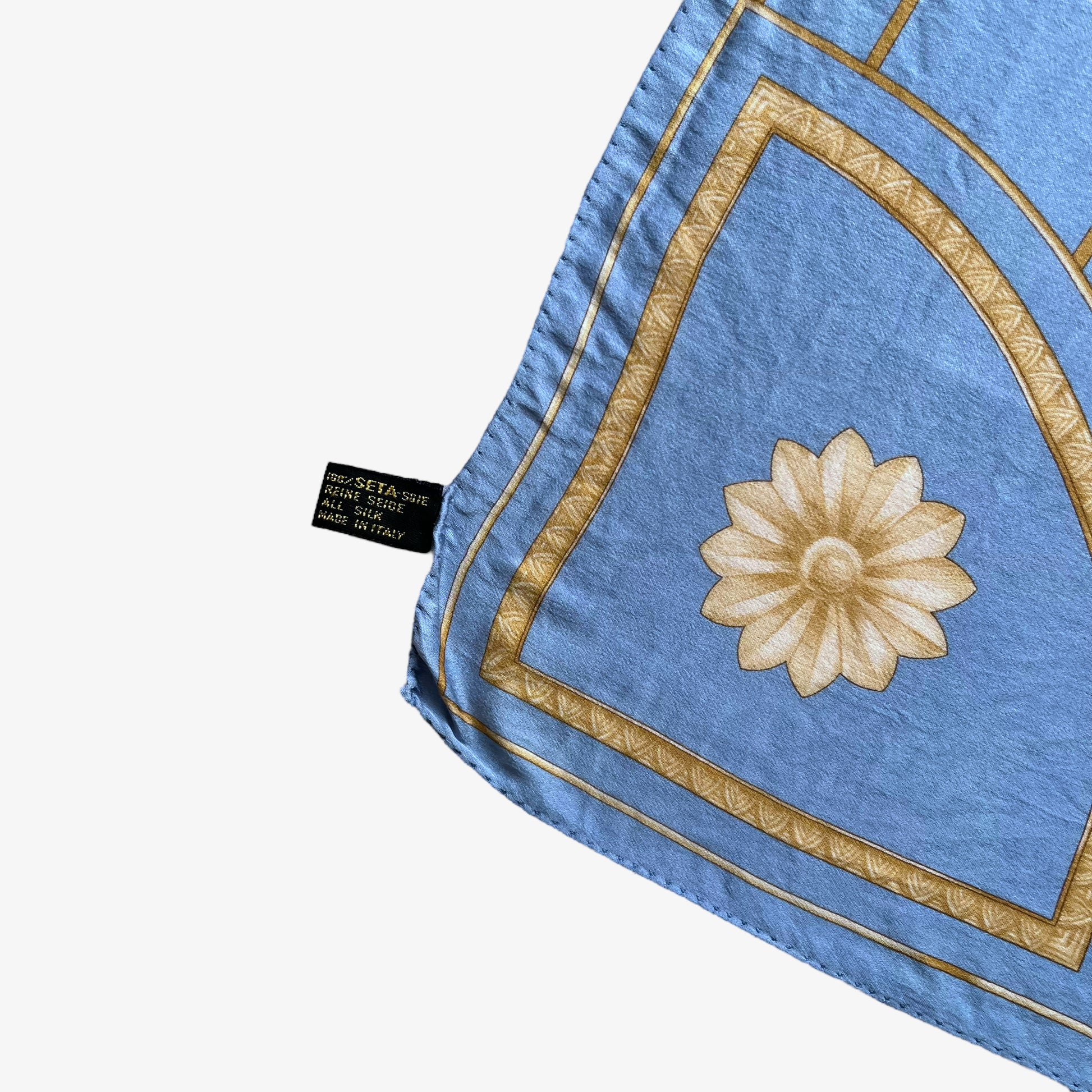 Made in Italy label on women's vintage 80s Lanvin Paris gold art deco cat print blue silk scarf.