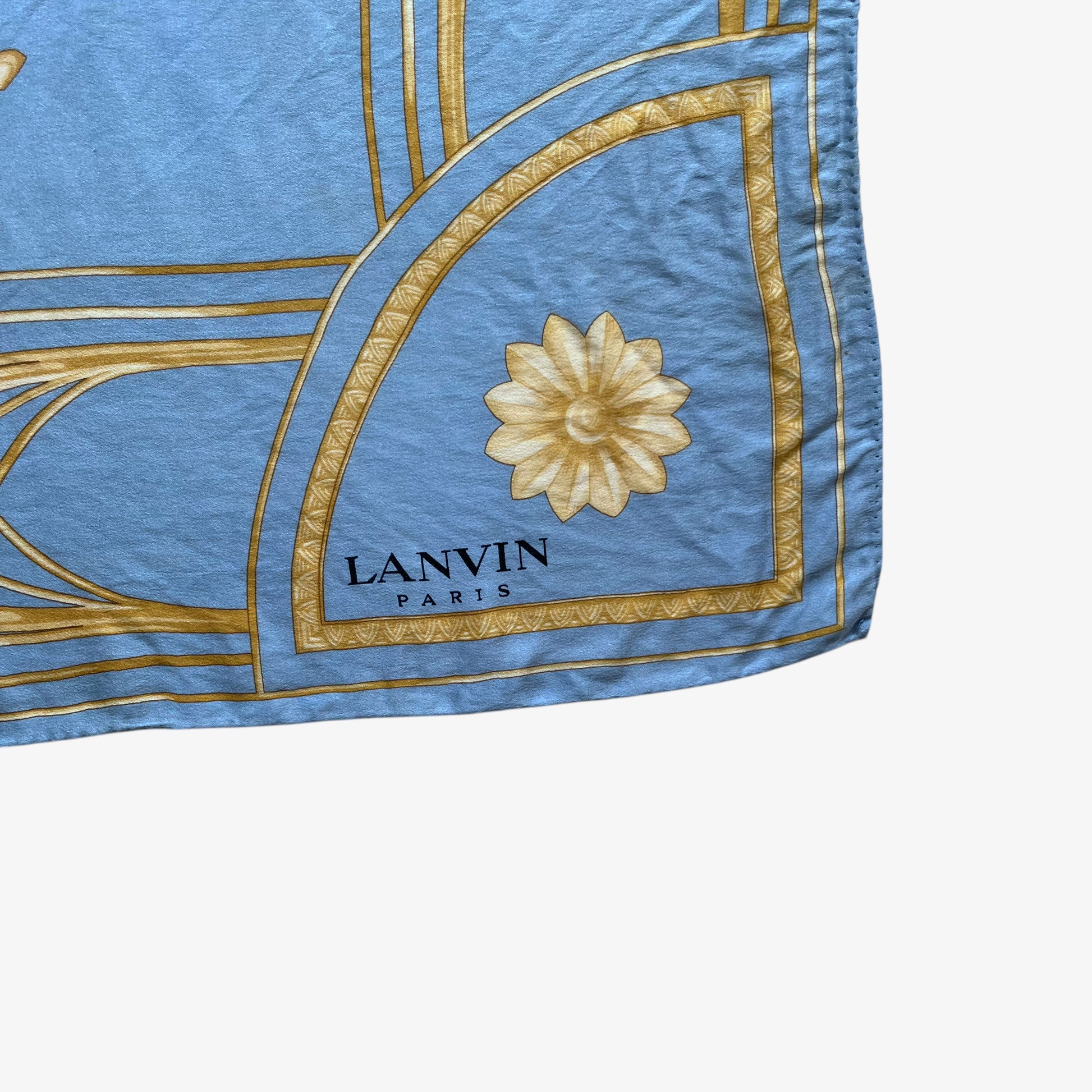 Lanvin Paris spell out logo on women's vintage 80s gold art deco cat print blue silk scarf.
