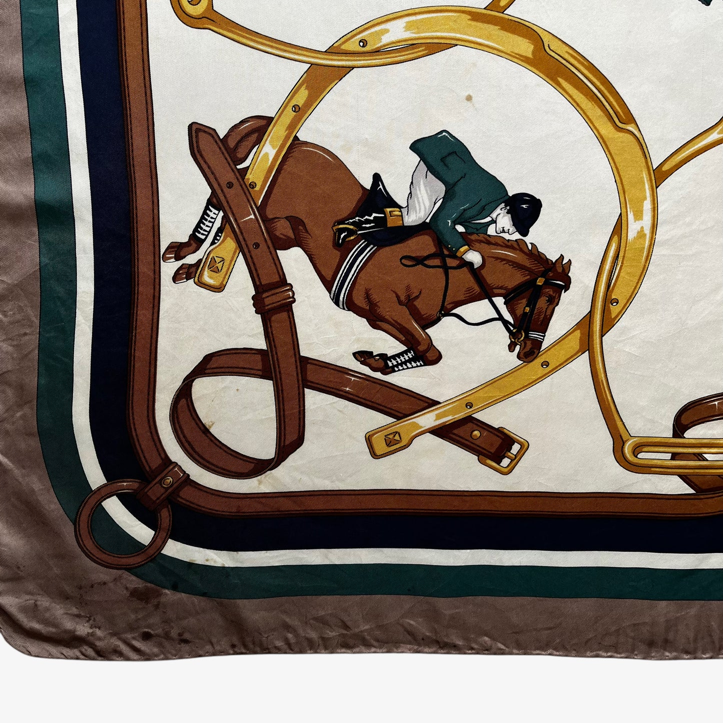 General wear on women's vintage 80s Longchamp equestrian and horseshoe print silk scarf.