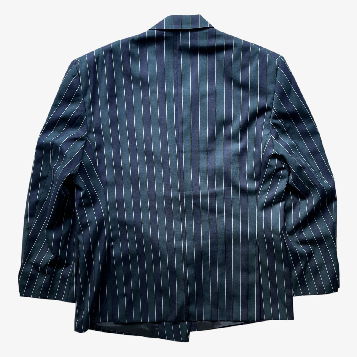A vintage men's Beatties navy and green striped boating blazer shown from the back, featuring thin vertical white stripes on a light grey background.