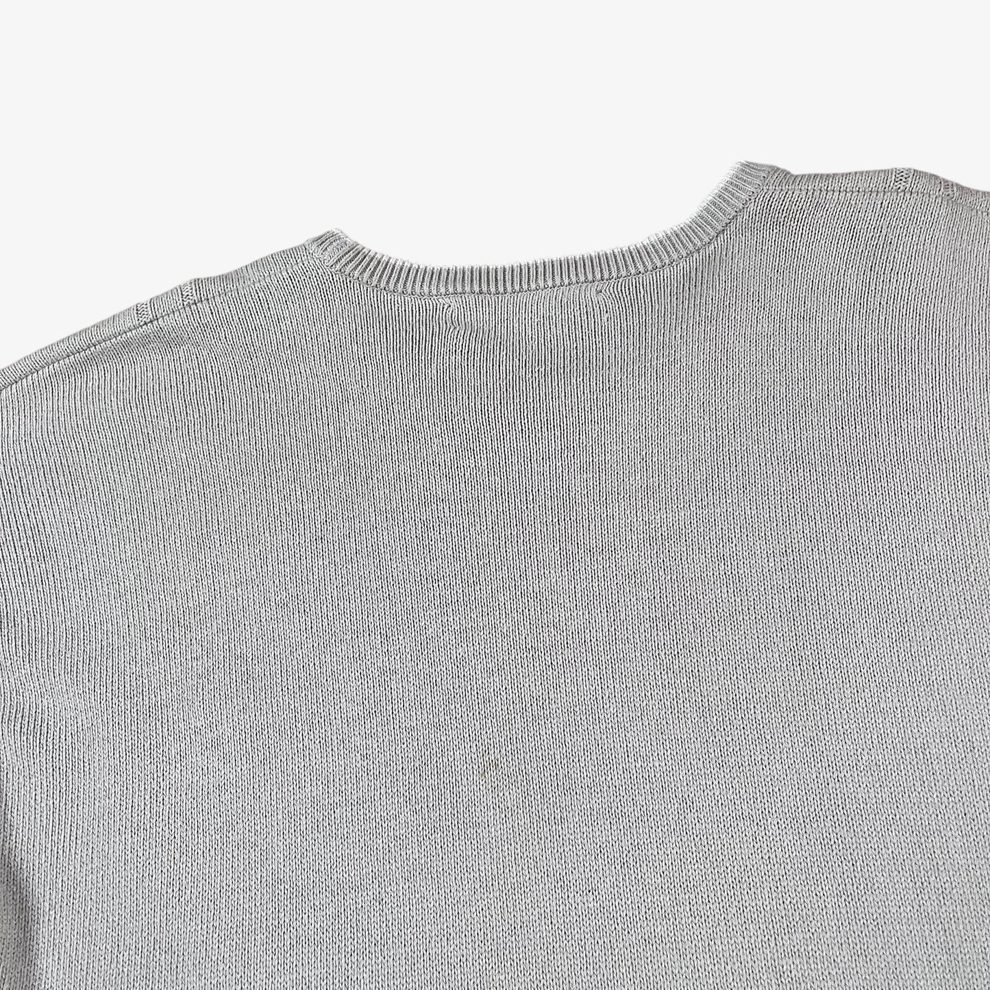 Plain back of vintage 80s Burberry men’s beige cable knit jumper with embroidered sailing motif.