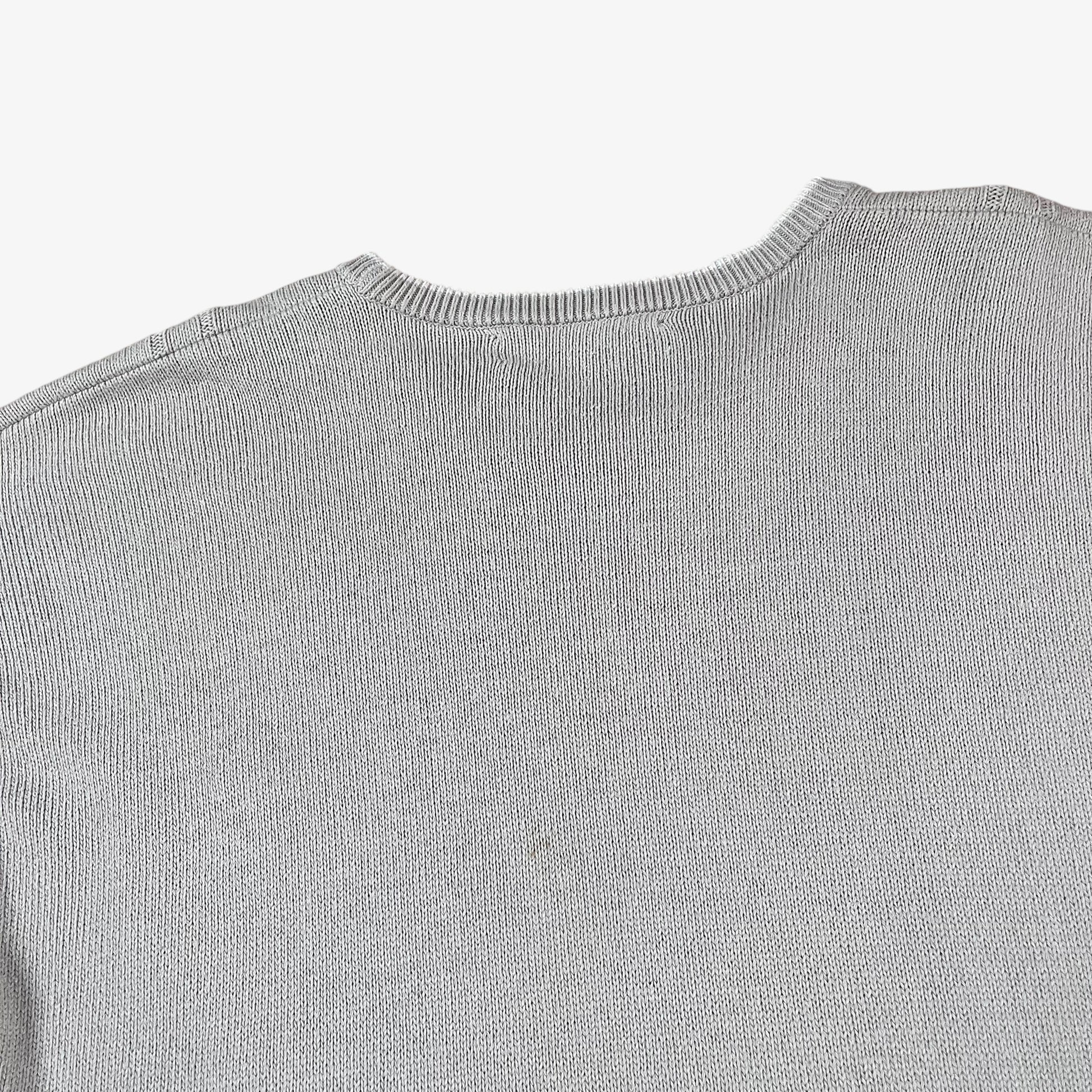 Plain back of vintage 80s Burberry men’s beige cable knit jumper with embroidered sailing motif.