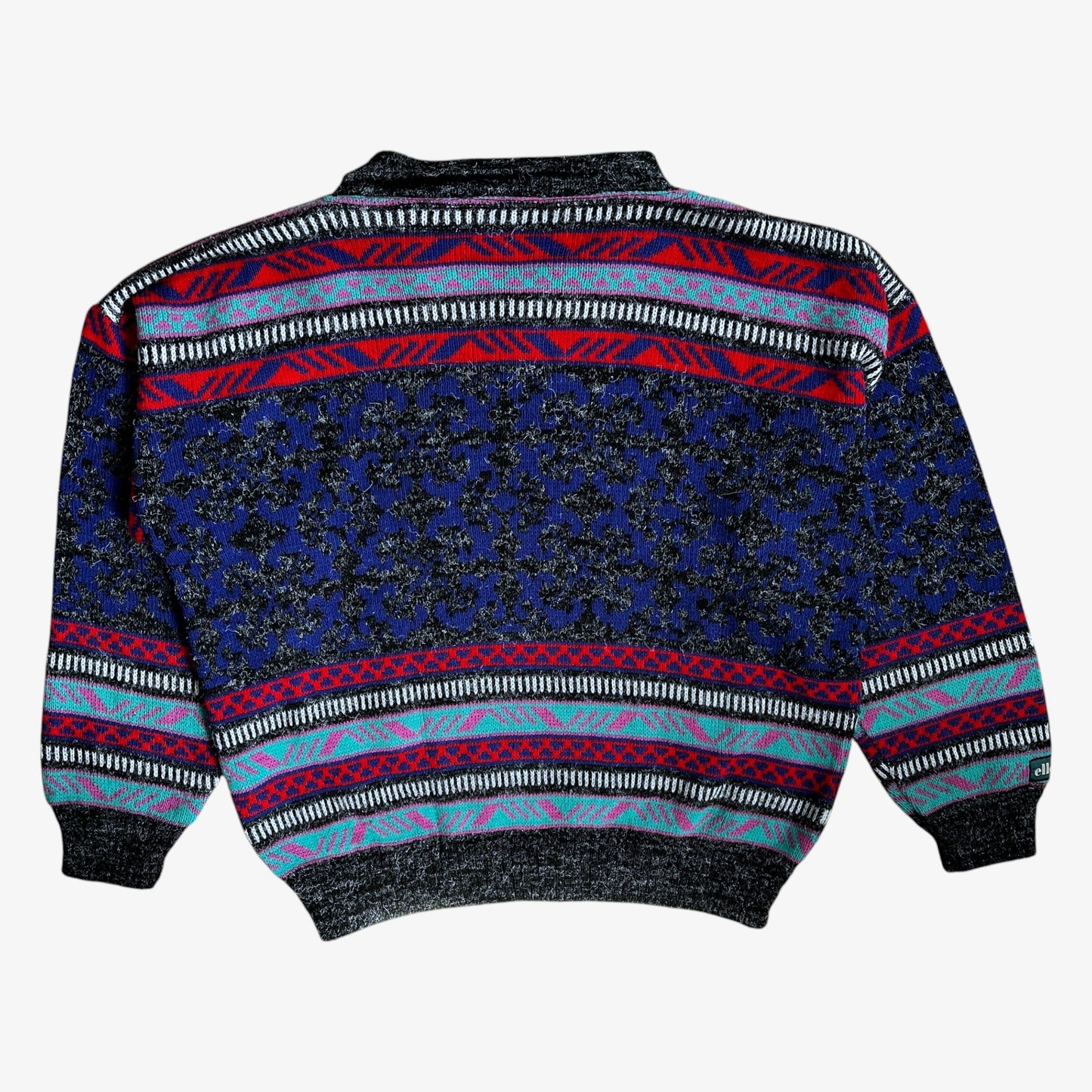 Back of Ellesse wool sweater with a colourful vintage 80s patterned design.