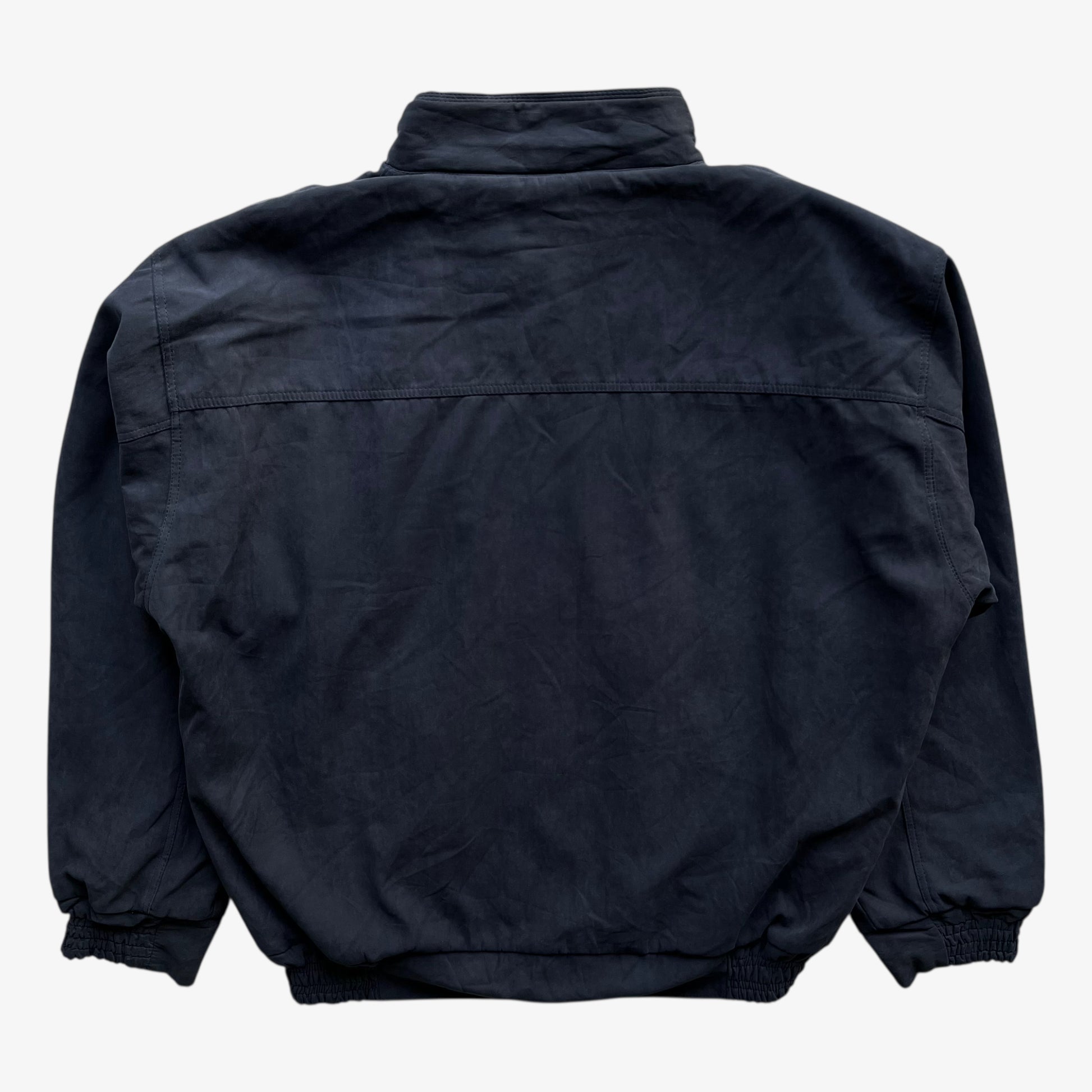 Back of men's vintage 80s Guess USA navy driving jacket.