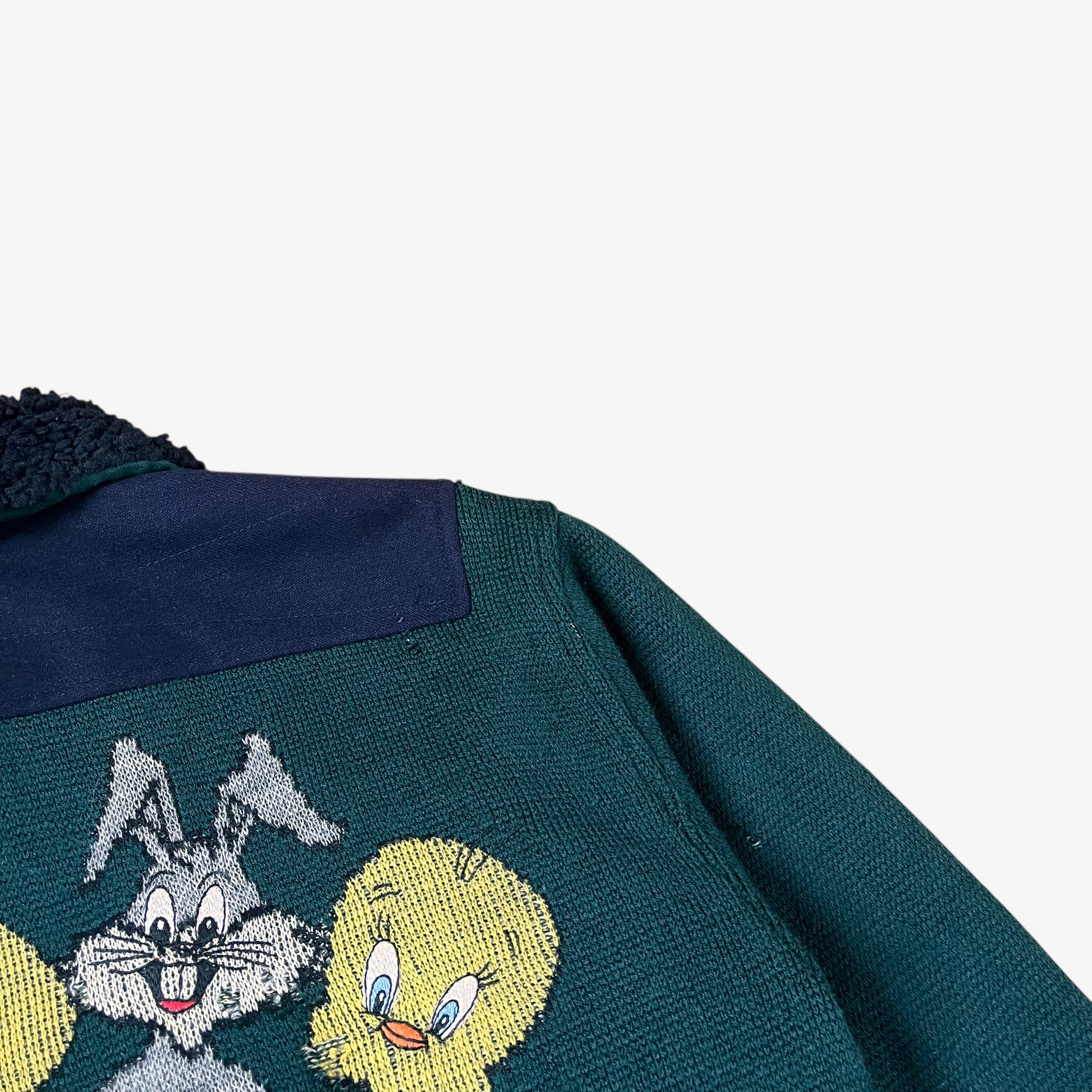 Bugs bunny design on vintage 80s Looney Tunes ICEBERG men’s green and navy wool varsity jacket.
