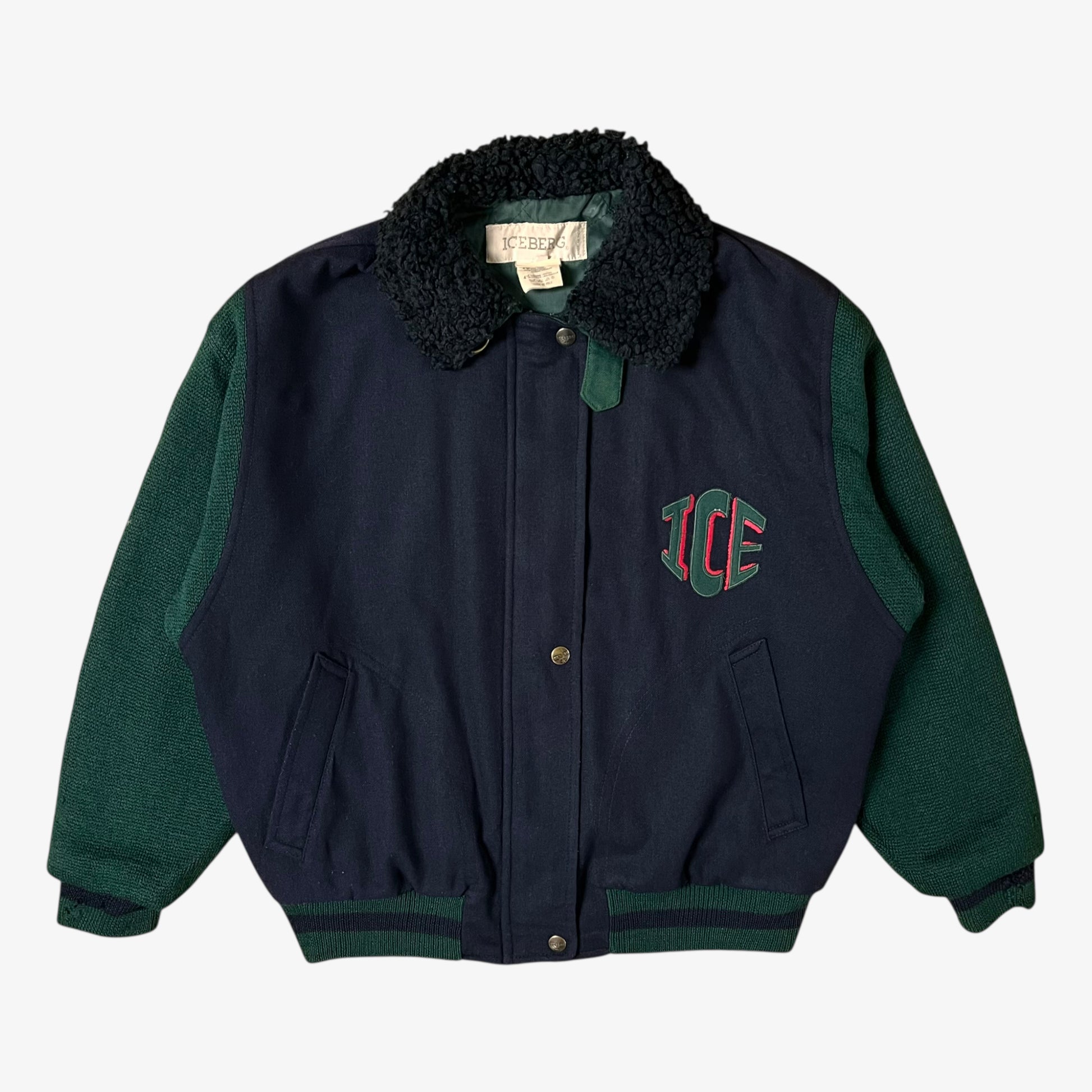 Vintage 80s Looney Tunes ICEBERG men’s green and navy wool varsity jacket from 1987 with embroidered cartoon details and letterman style.