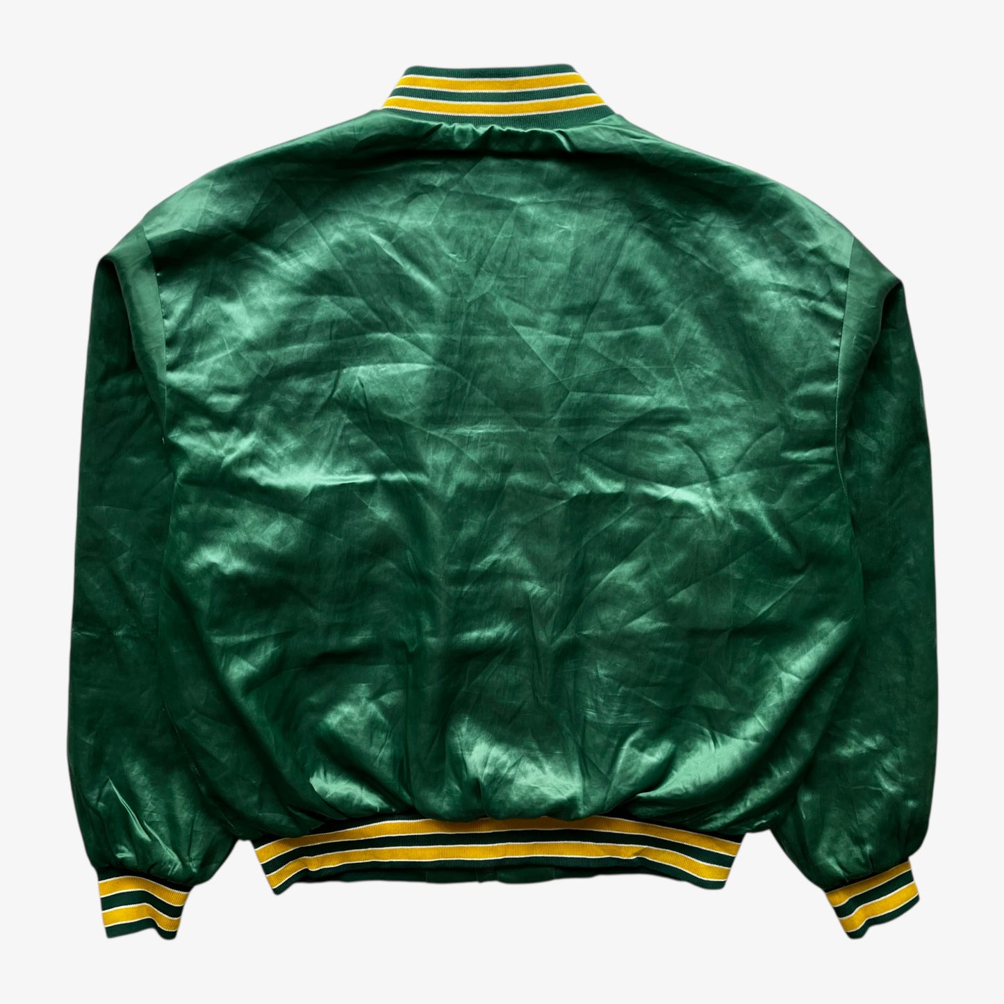 Back of vintage 80s men's Swingster MLB Oakland Athletics green varsity jacket.