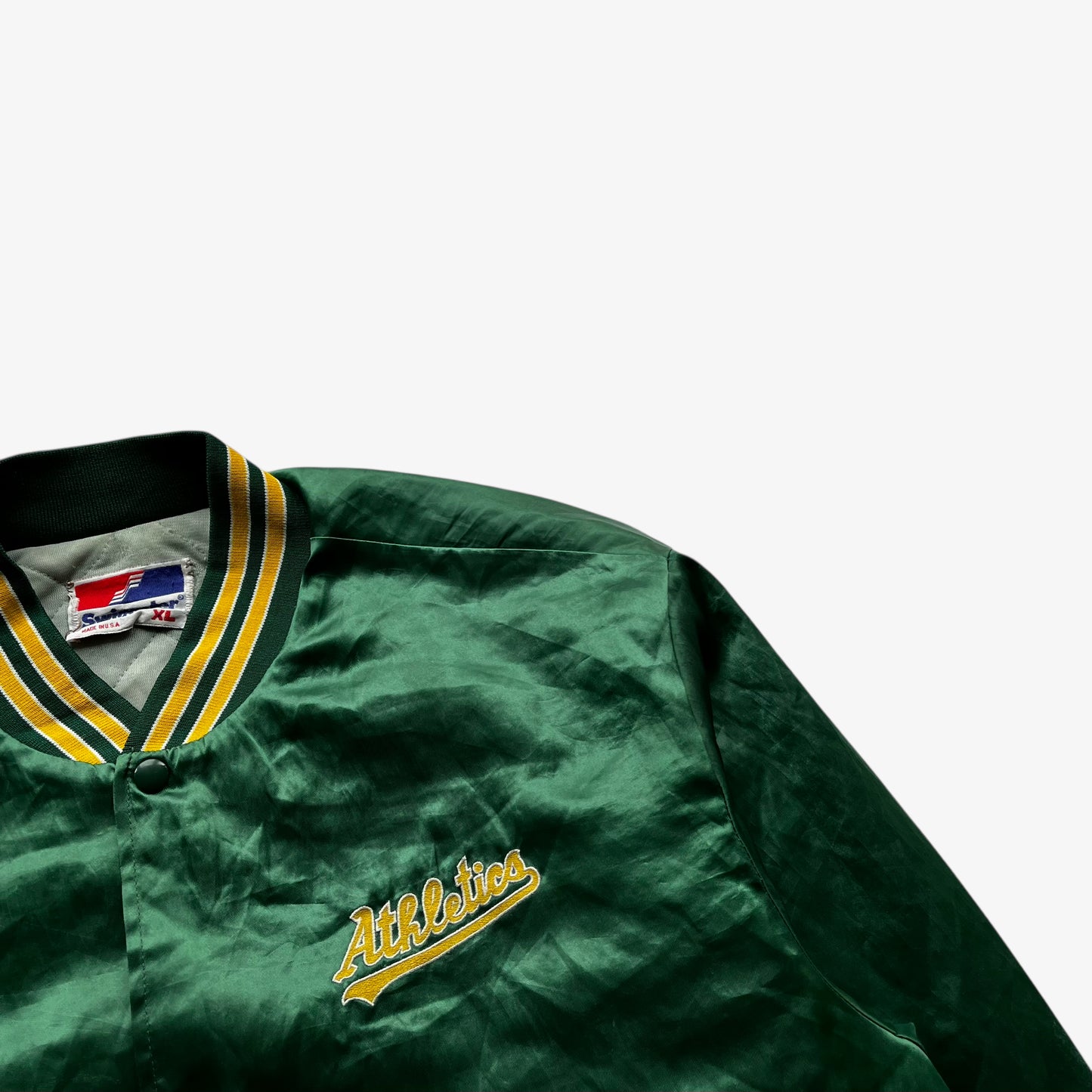 Athletics embroidered spell out on vintage 80s men's Swingster MLB Oakland A's green varsity jacket.