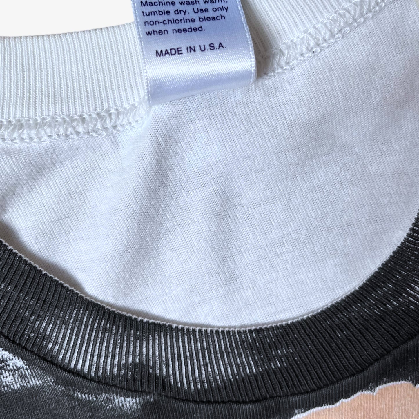 Made in USA label stitched inside of vintage 80s men's The Shining here's Johnny Jack Nicholson print single stitch white t-shirt.