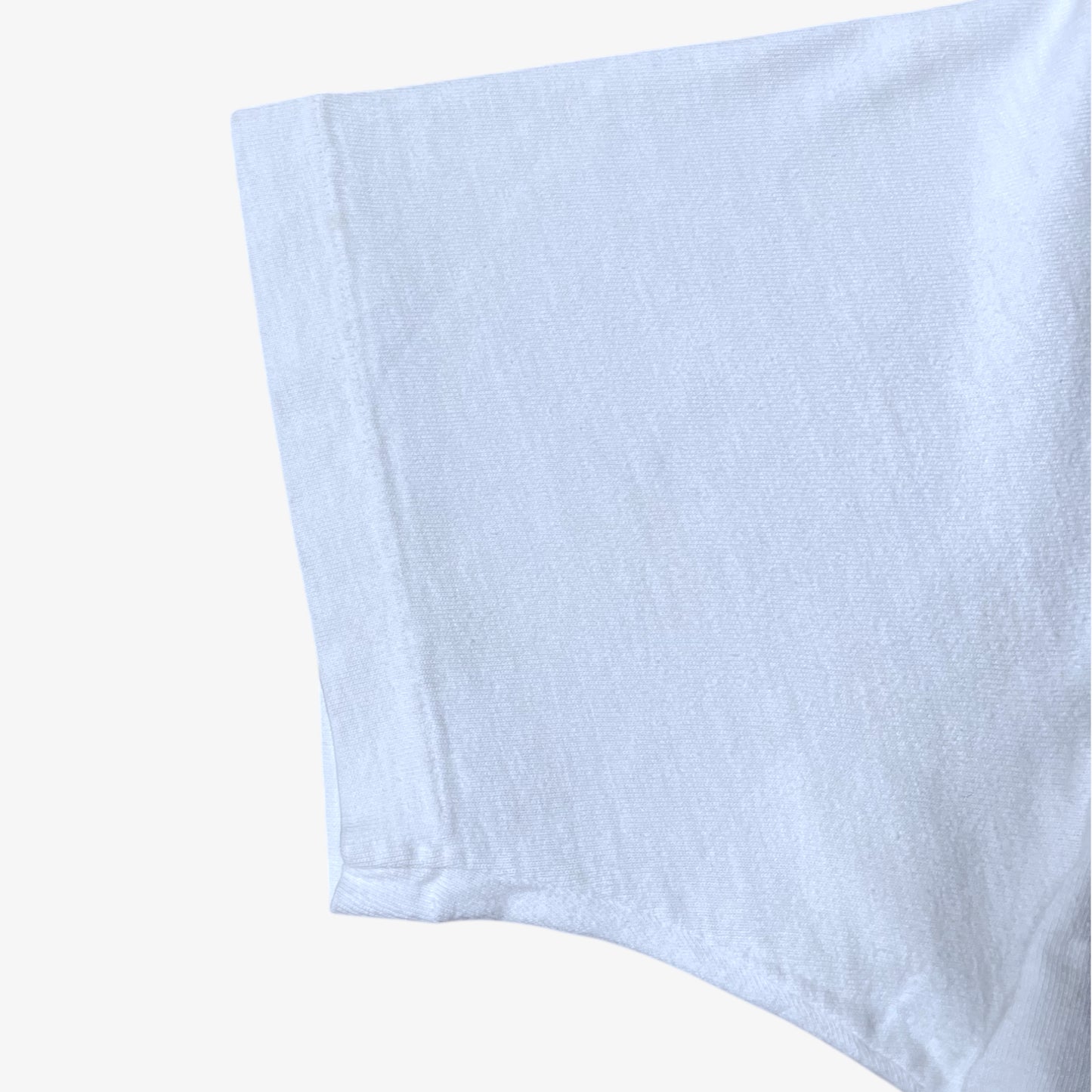 Single stitch on the sleeve of vintage 80s men's The Shining here's Johnny Jack Nicholson print white t-shirt.